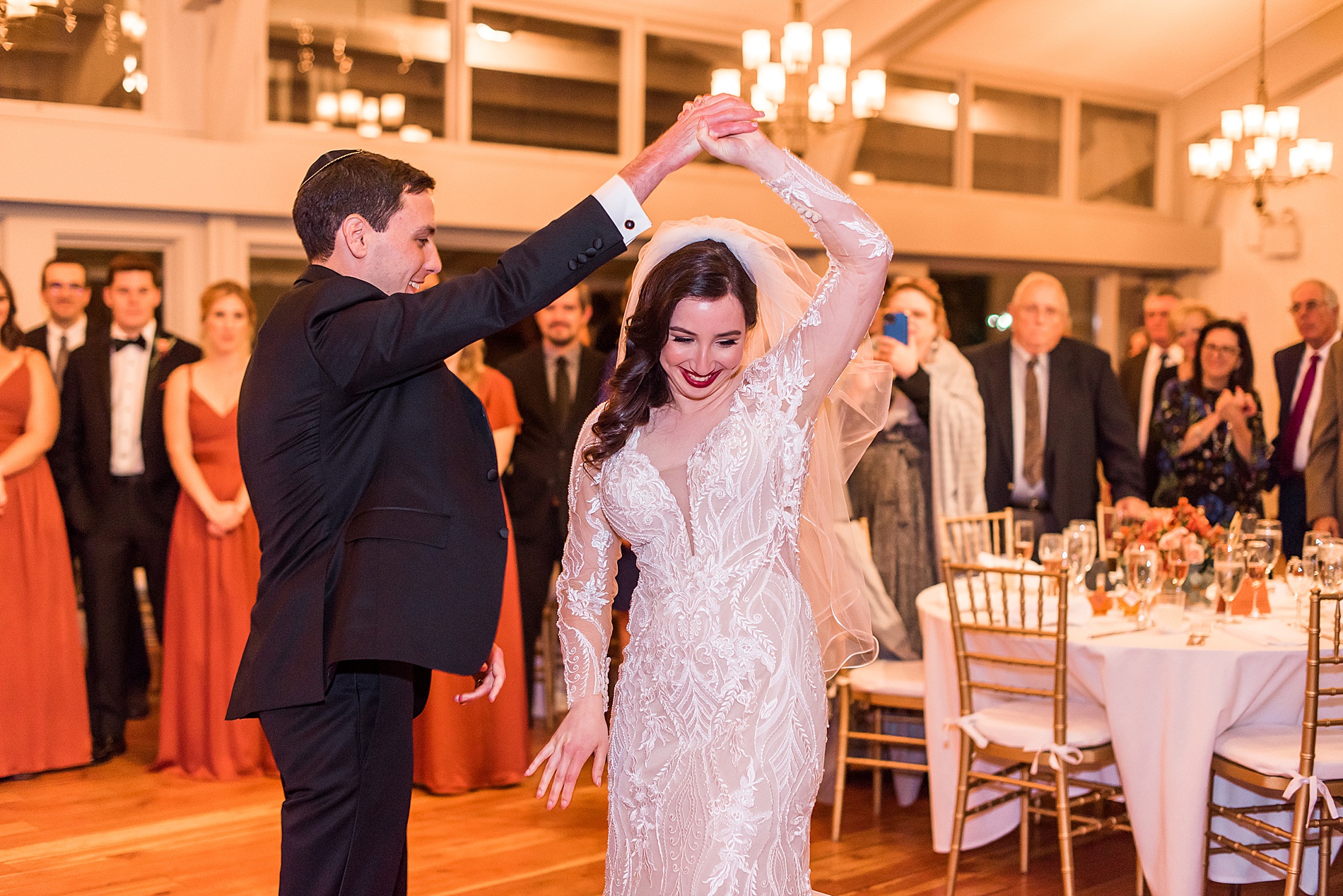 husband and wife dance at their Fall wedding reception in MA