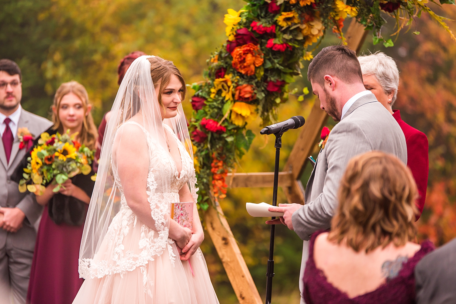 bride + groom sharing vows at New Hampshire wedding ceremony