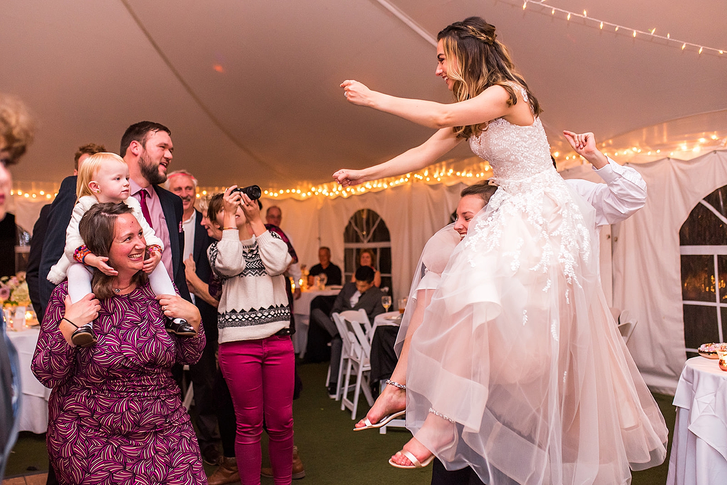 newlyweds celebrating on the dance floor at NH wedding reception