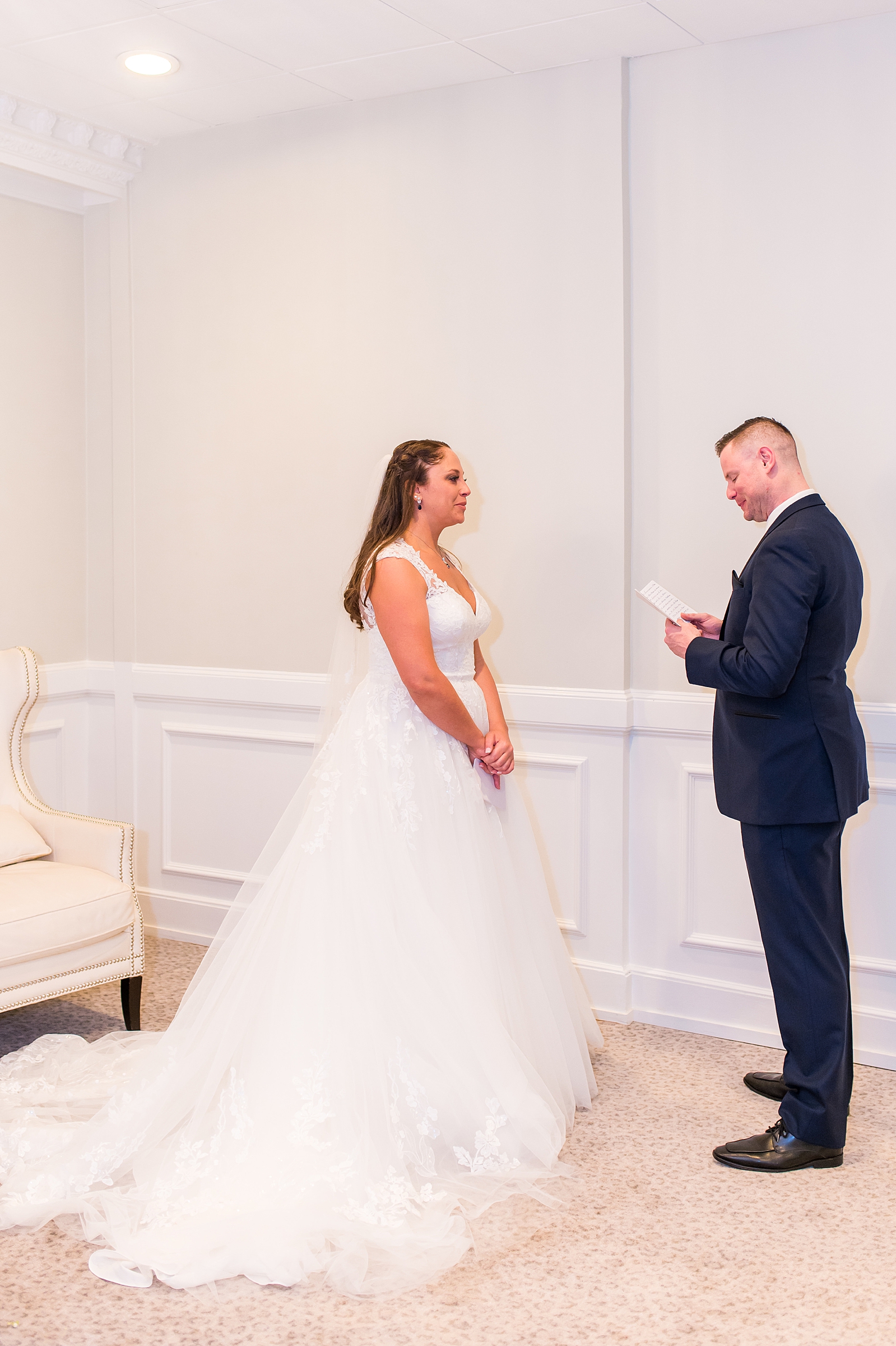 bride and groom exchange vows privately at intimate winter wedding