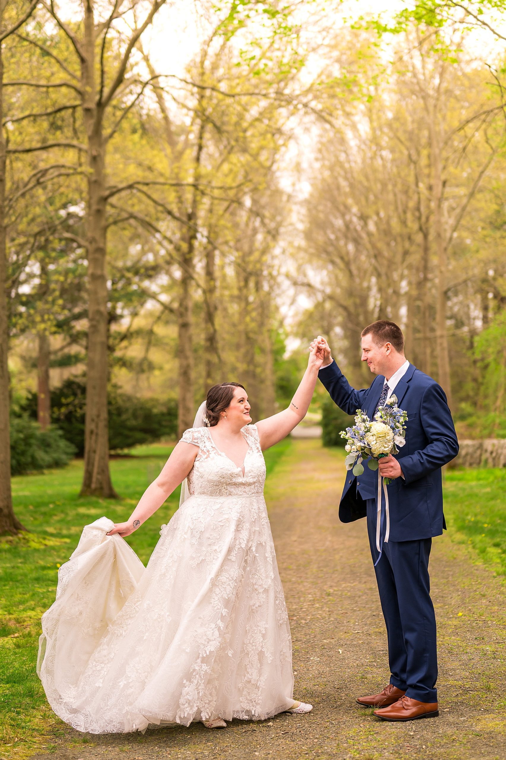 wedding portraits on the tree lined path