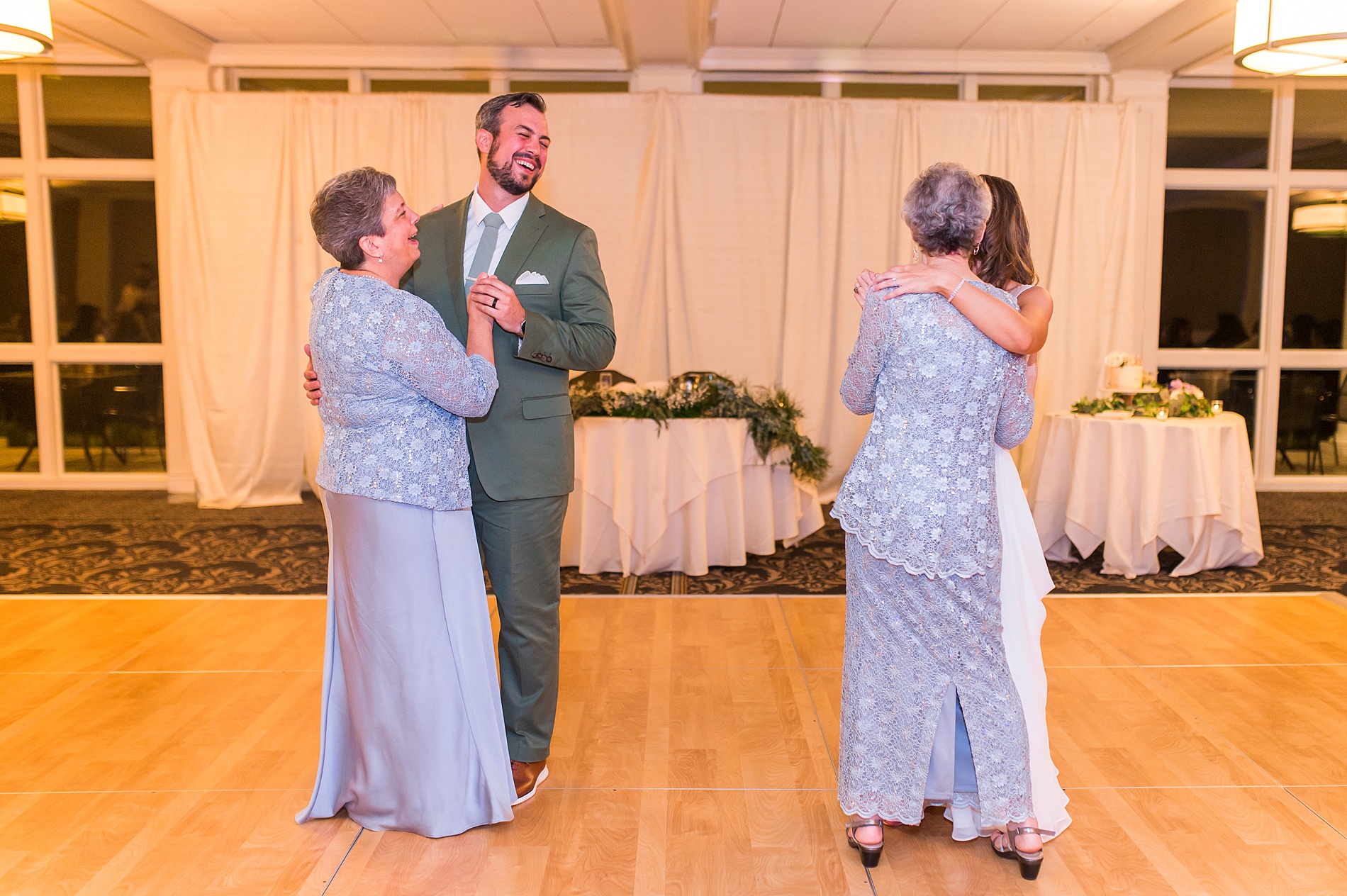 bride and groom have a joint moms dance at Manchester Country Club Wedding reception
