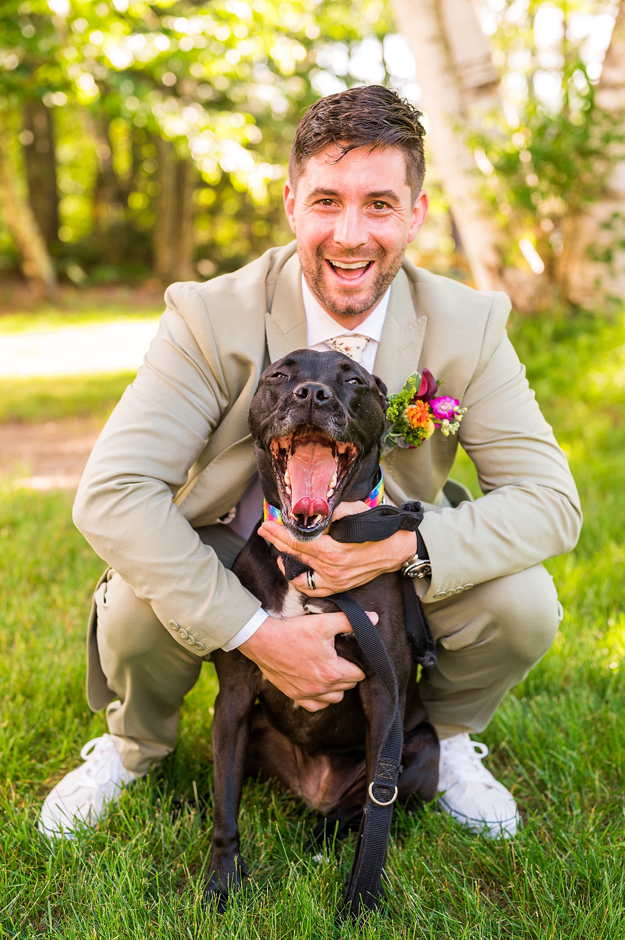 groom with one of their dogs 