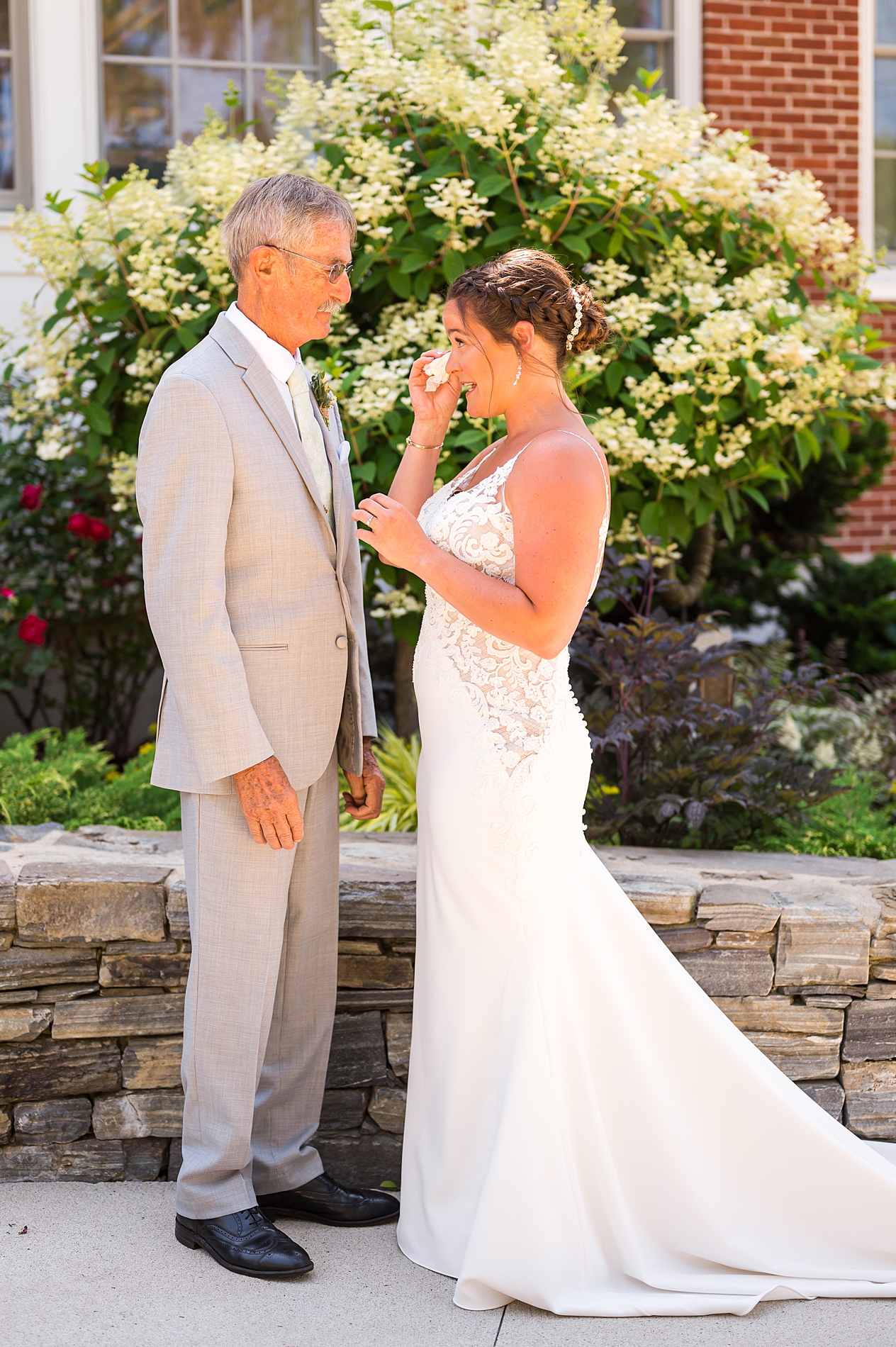 emotional bride during first look with grandfather