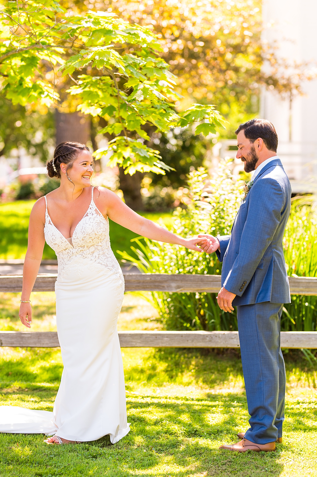 bride and groom during first look before outdoor wedding ceremony in Maine