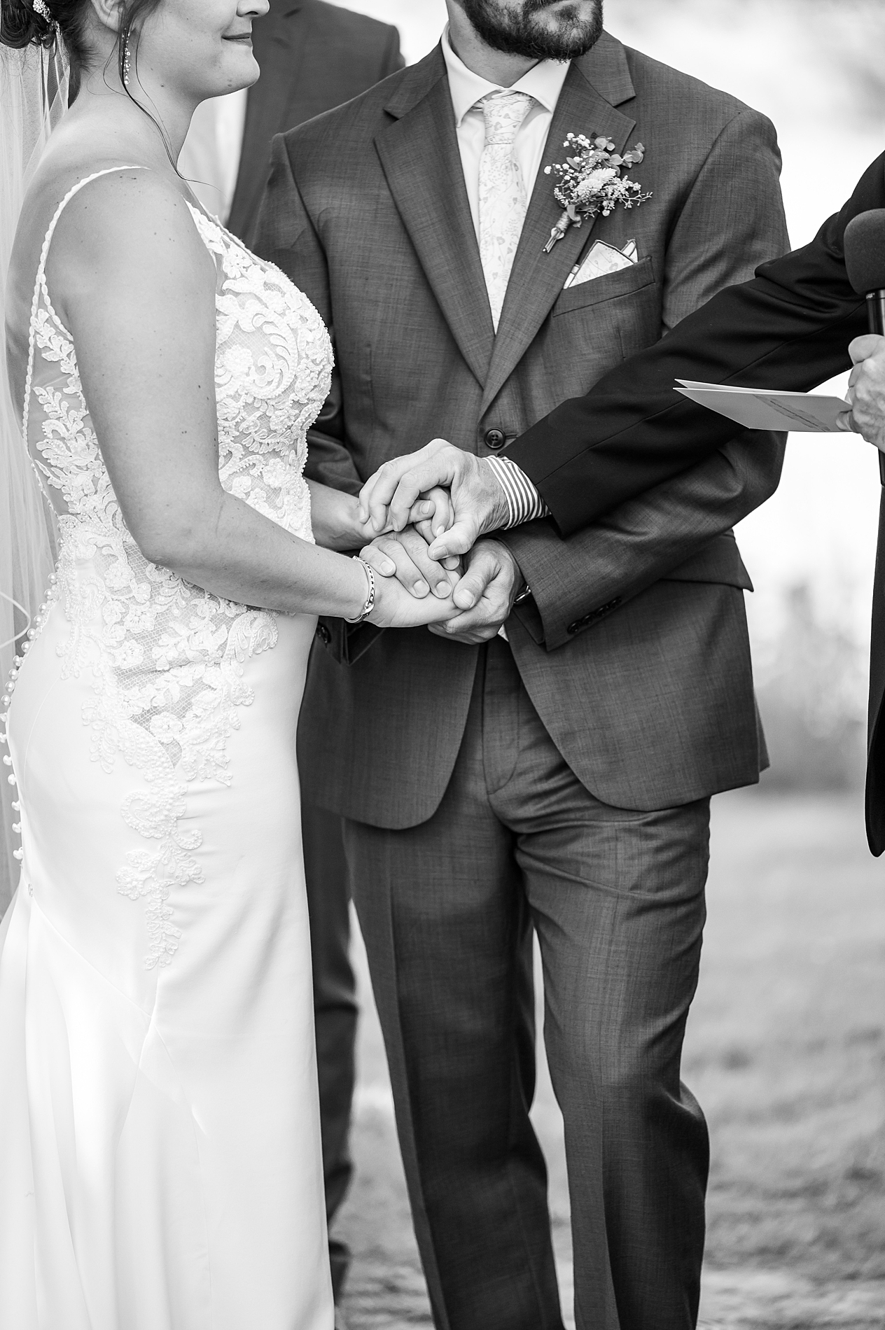 couple holding hands with bride's grandparents