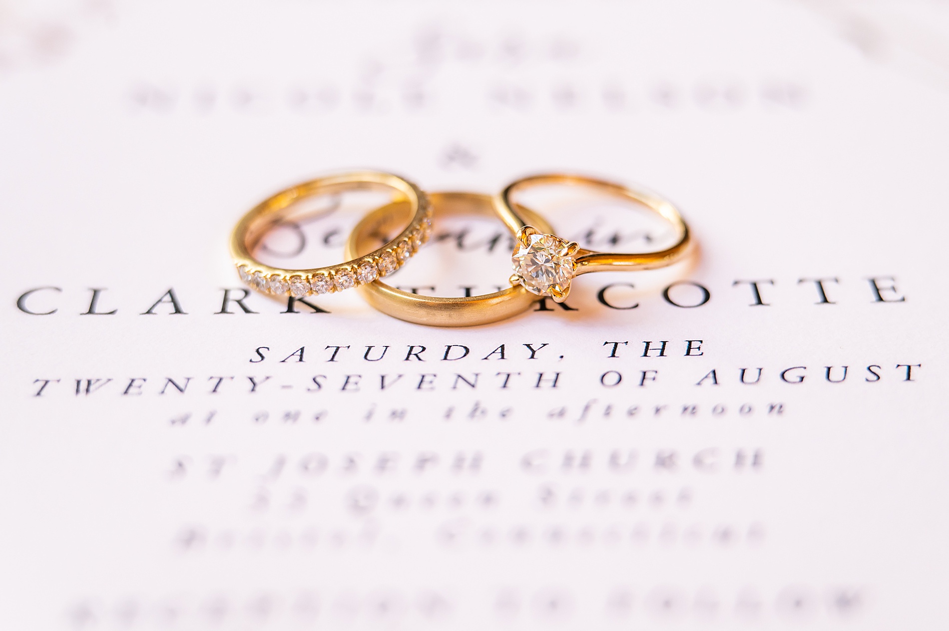 wedding rings on wedding invitation