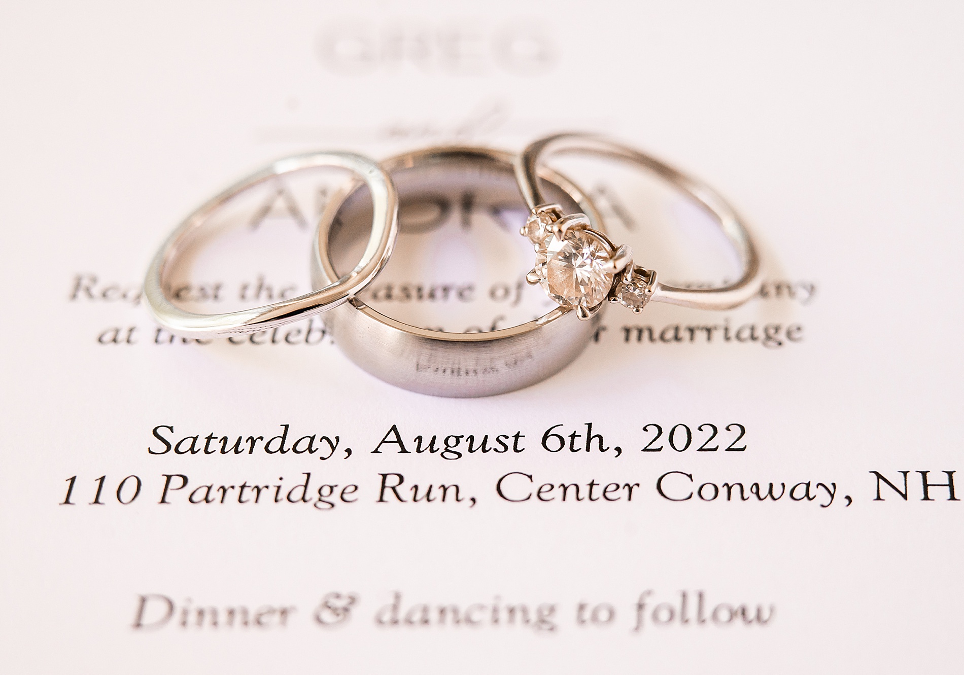 wedding rings on invitation from intimate summer wedding  