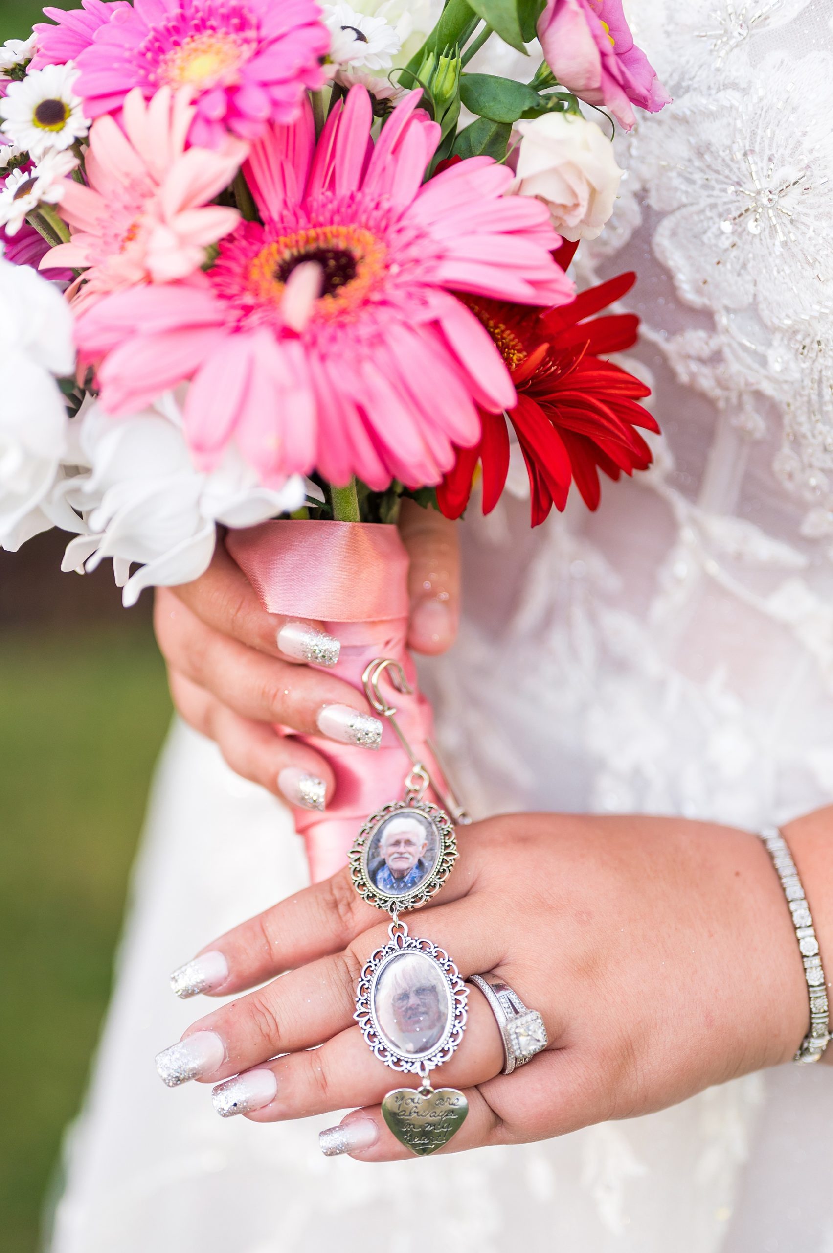 blush pink wedding bouquet with bouquet charm