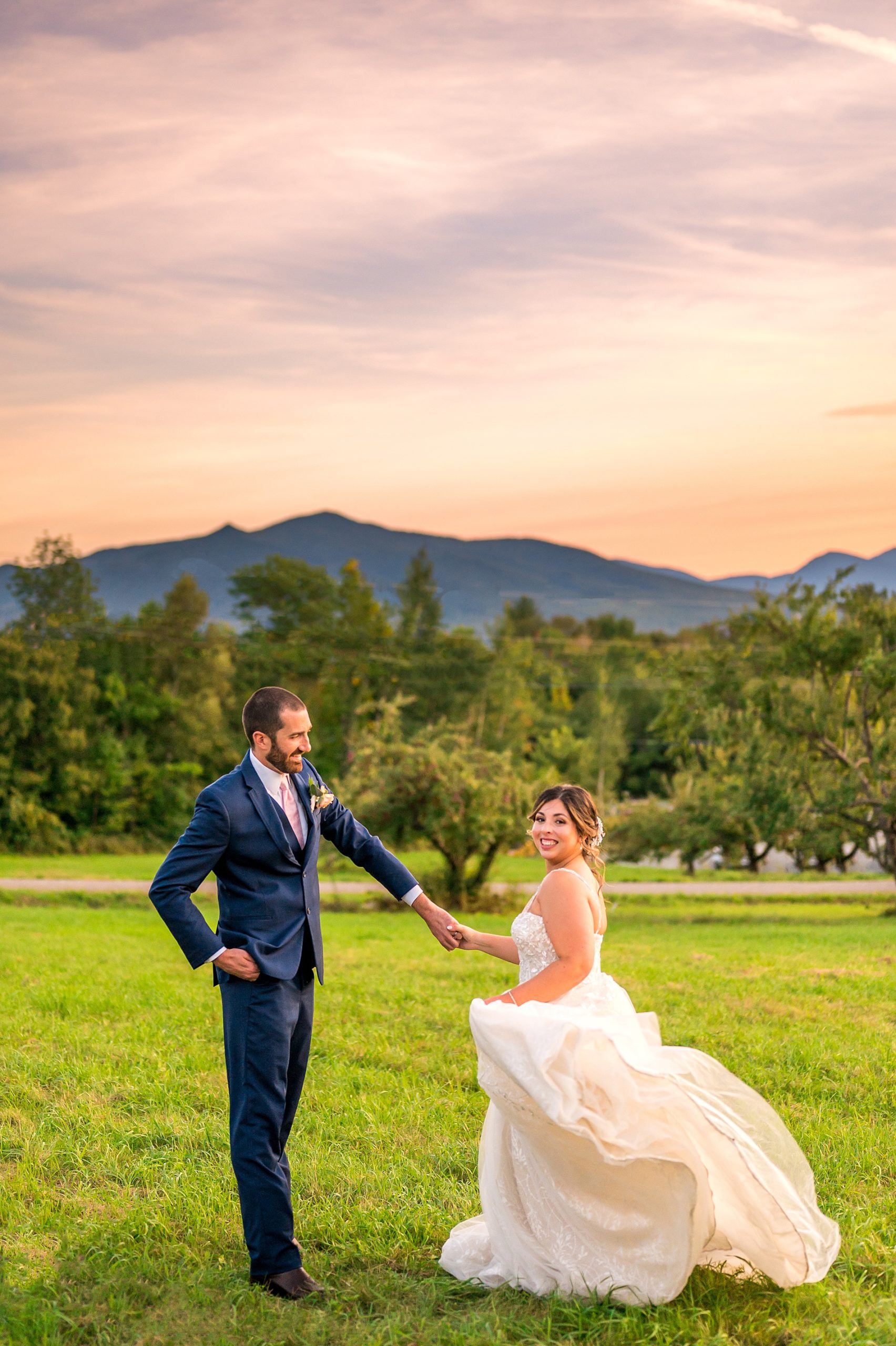 Bellevue Barn Summer Wedding portraits with White mountains in the background