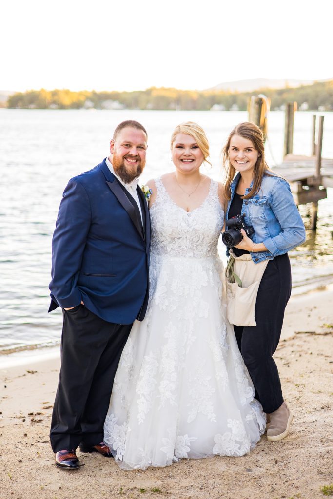 Southern NH wedding photographer with bride and groom at waterfront wedding 
