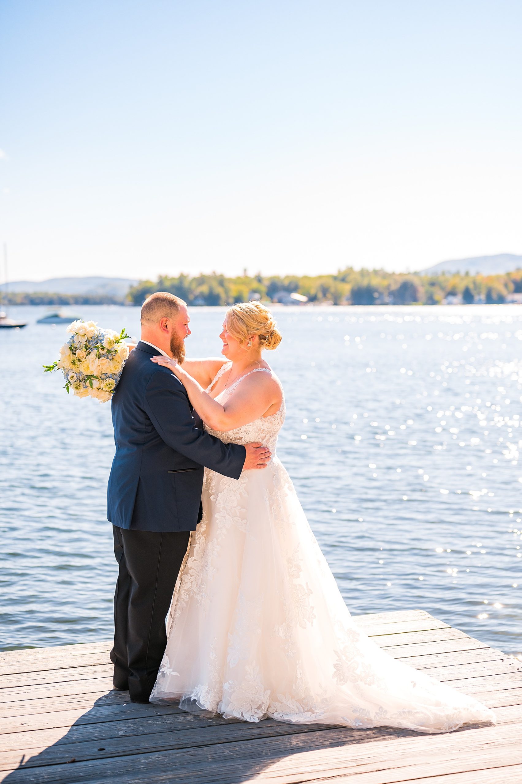 wedding portraits by the water at Wolfeboro Inn