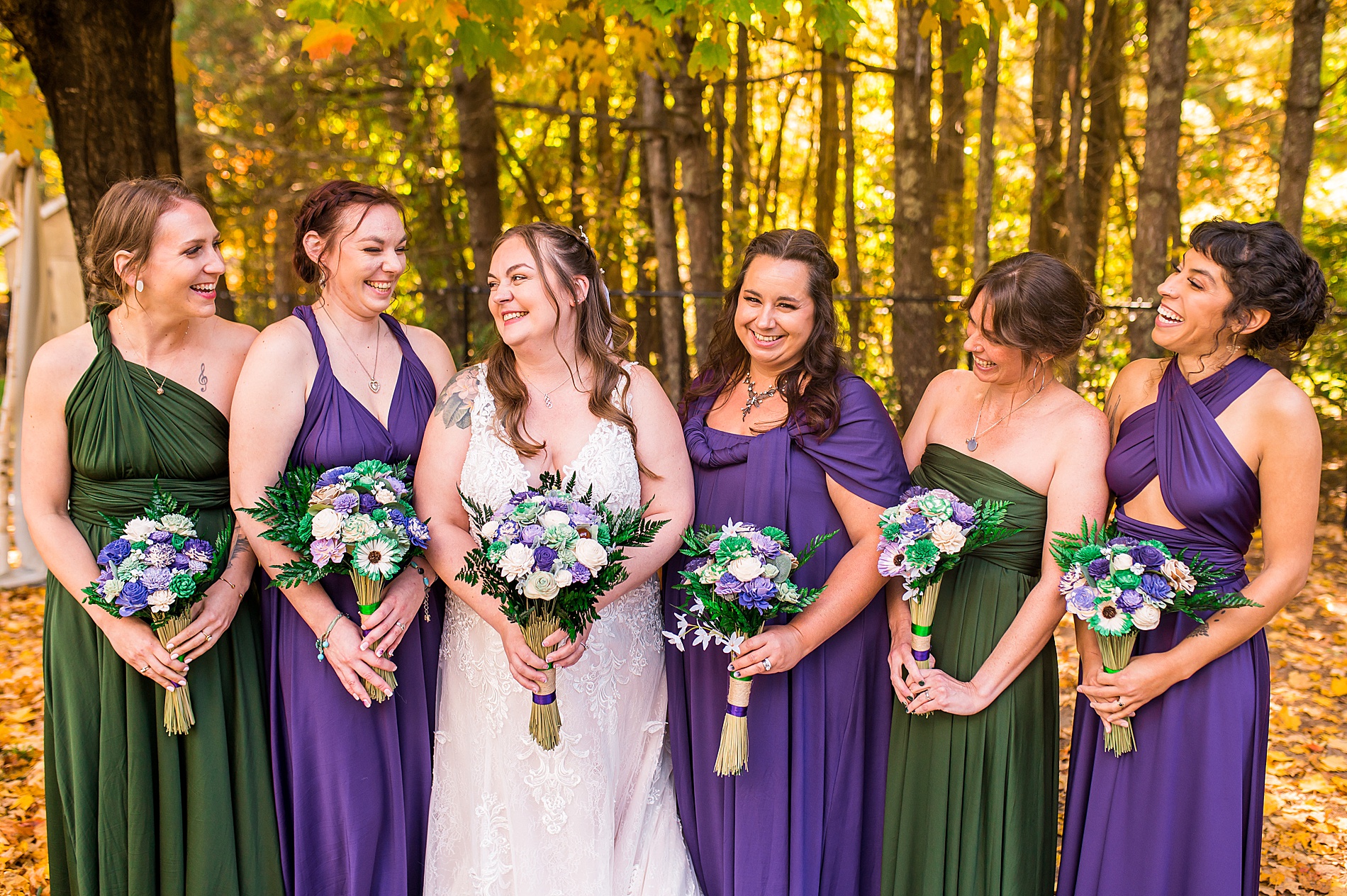bridesmaids surround bride during portraits