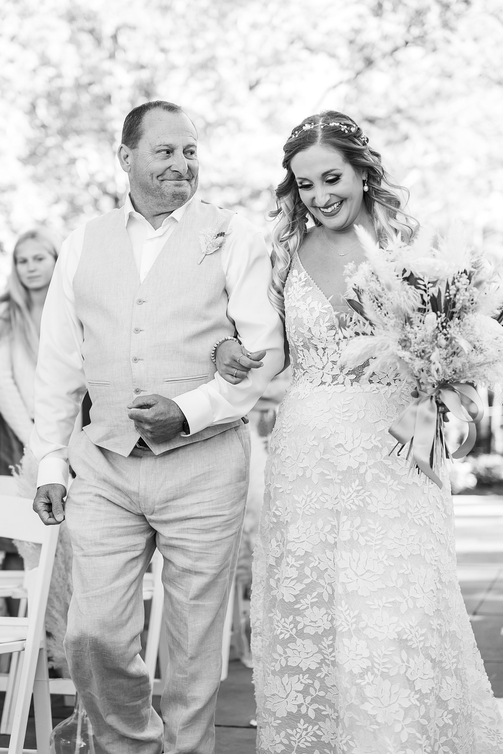 father walks his daughter down the aisle 