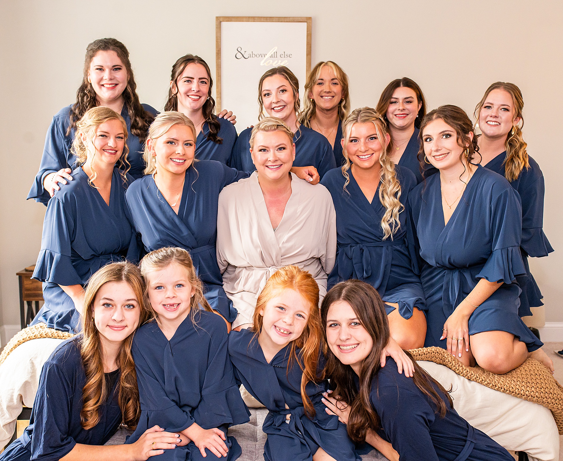 bride with bridesmaids in matching navy robes