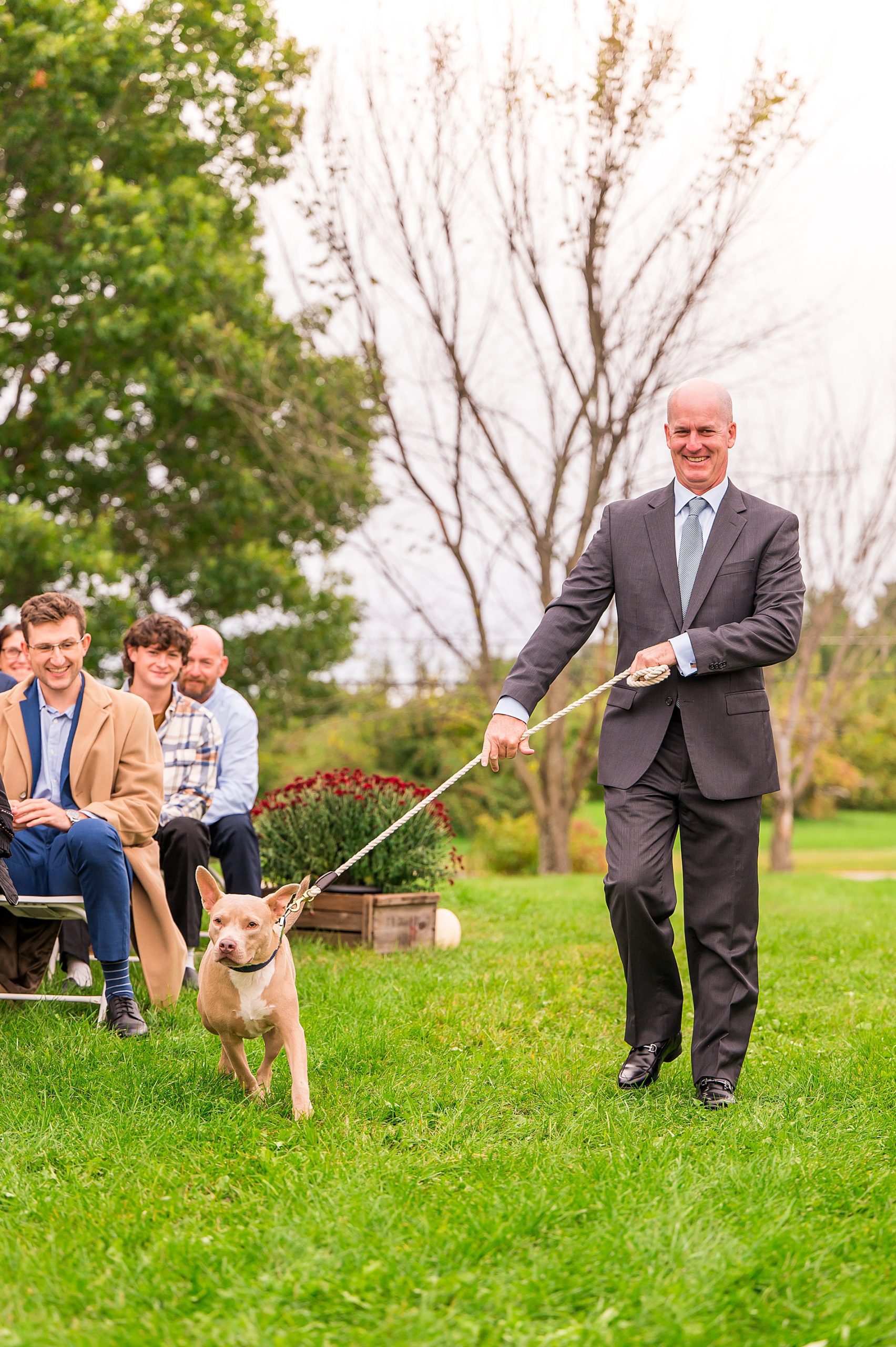 couple's dog gets walked down the aisle 