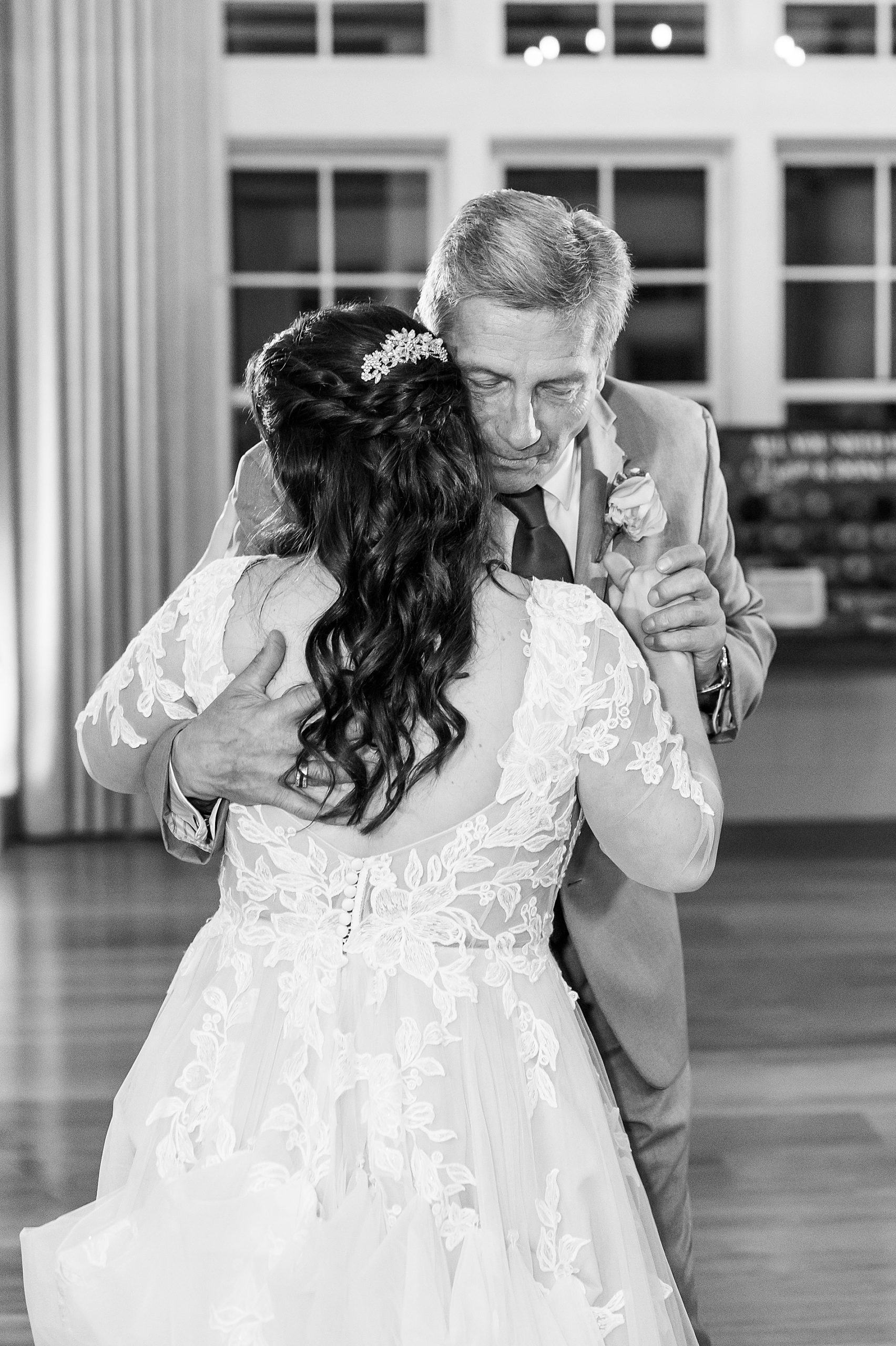 bride dances with her father at wedding reception 