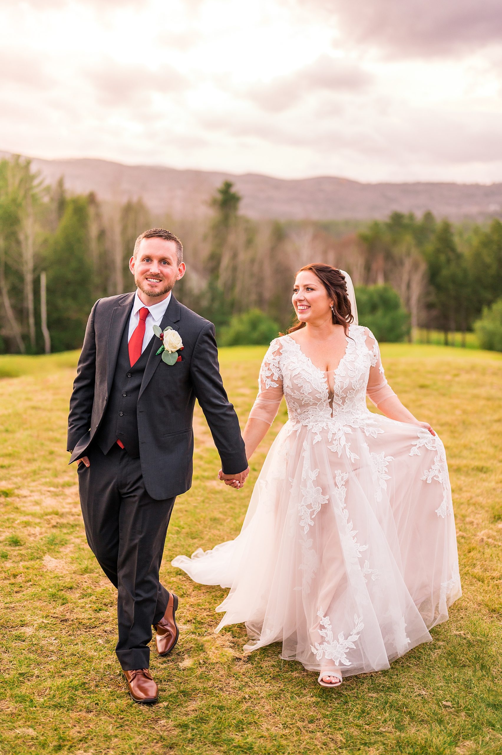 newlywed wedding portraits with mountain range in the background