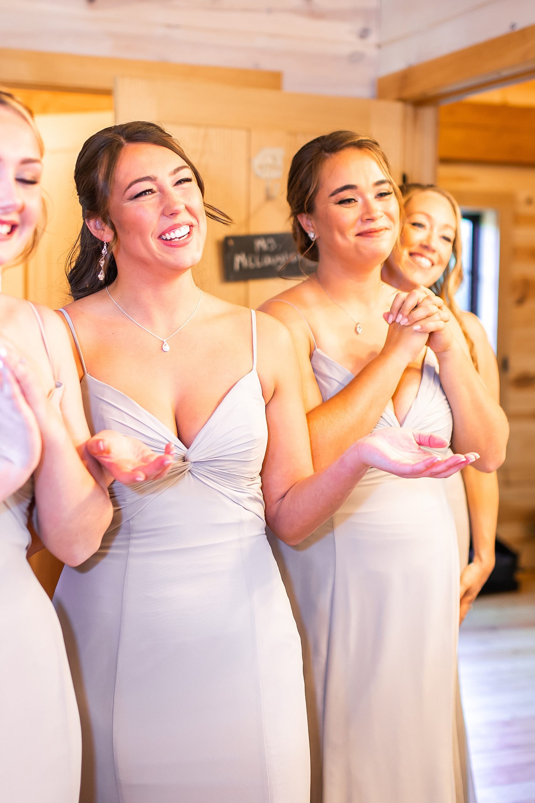 bridesmaids react to seeing bride for the first time before Concord New Hampshire Wedding