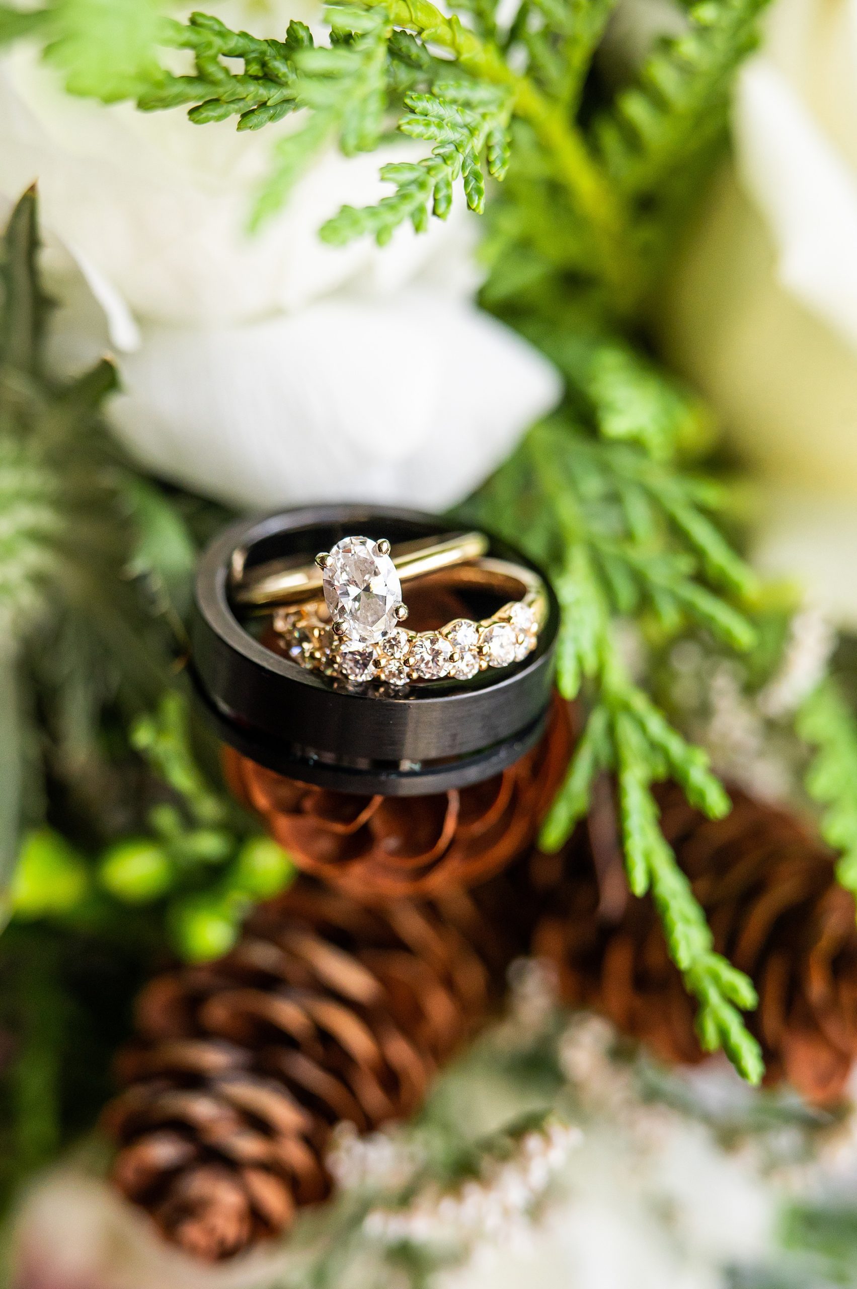 wedding rings on winter wedding bouquet