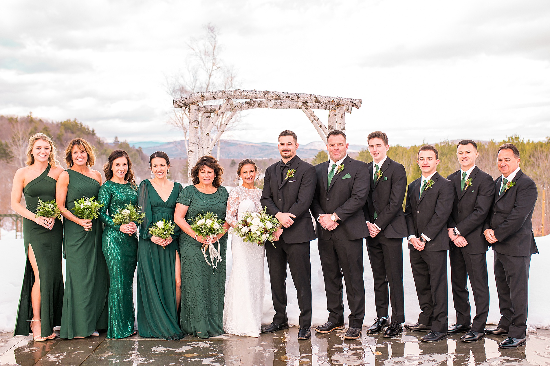 Winter Wedding party portraits with the mountains 
