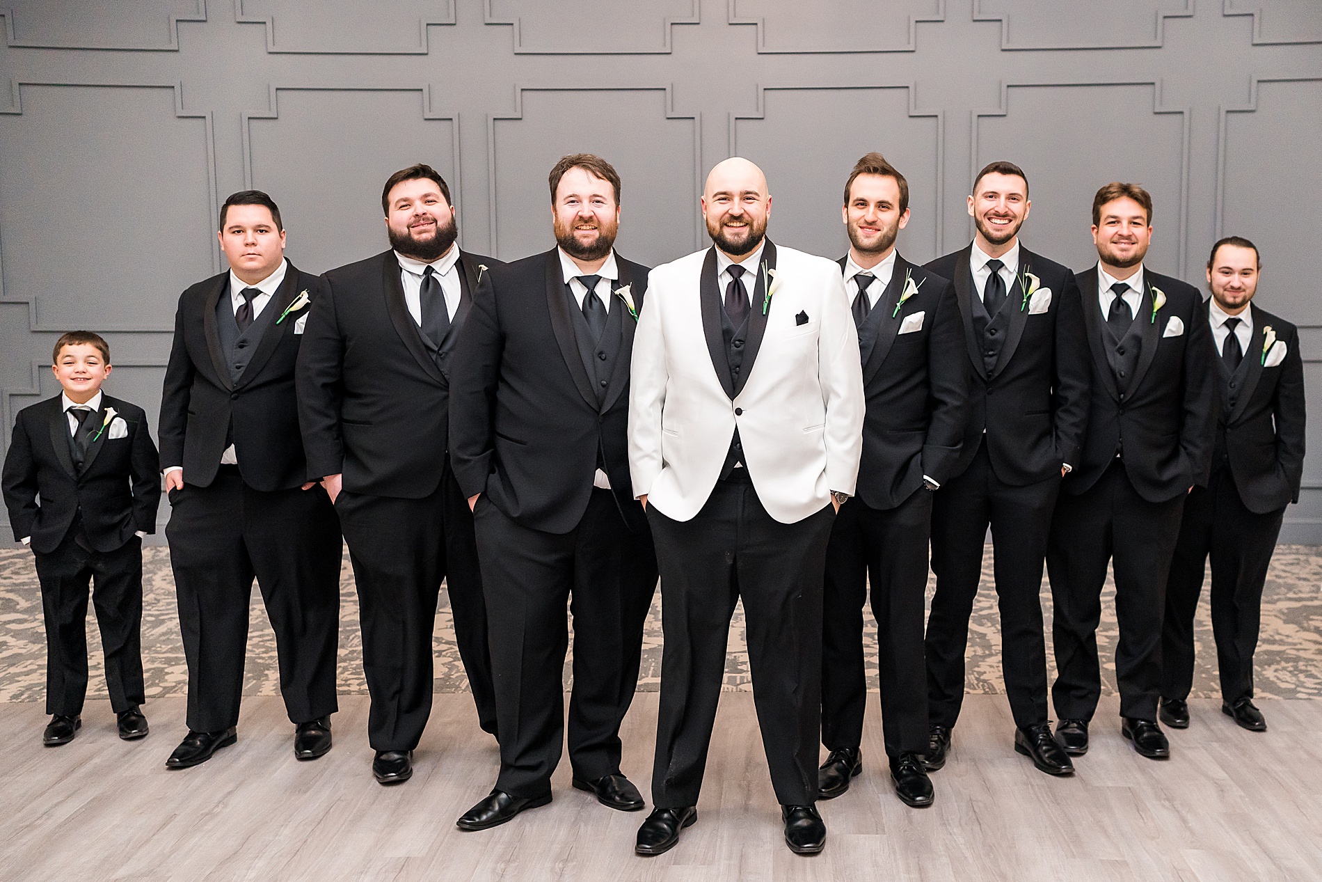 groomsmen with groom during wedding party portraits