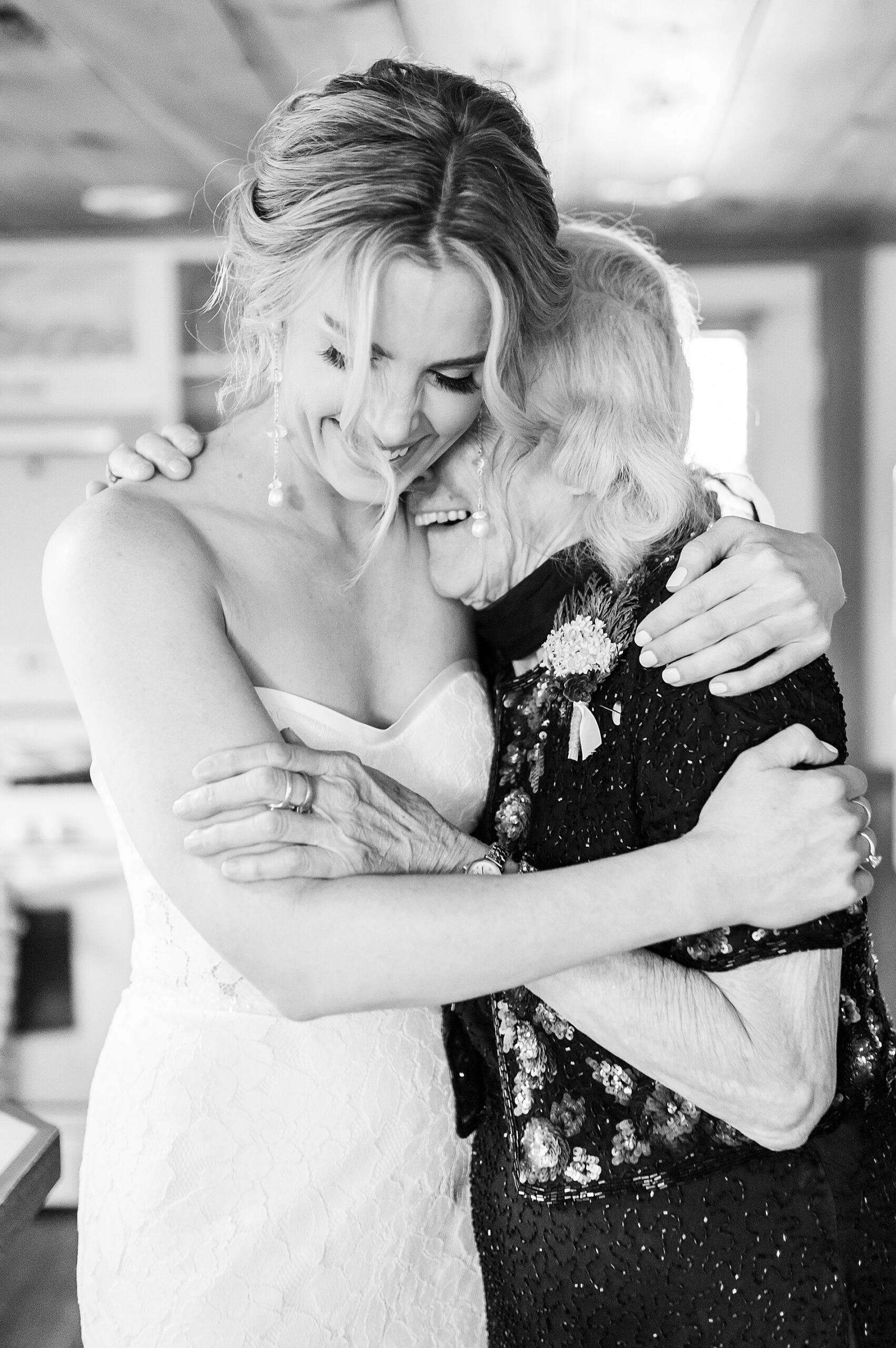 candid and heartwarming moment between bride and grandmother