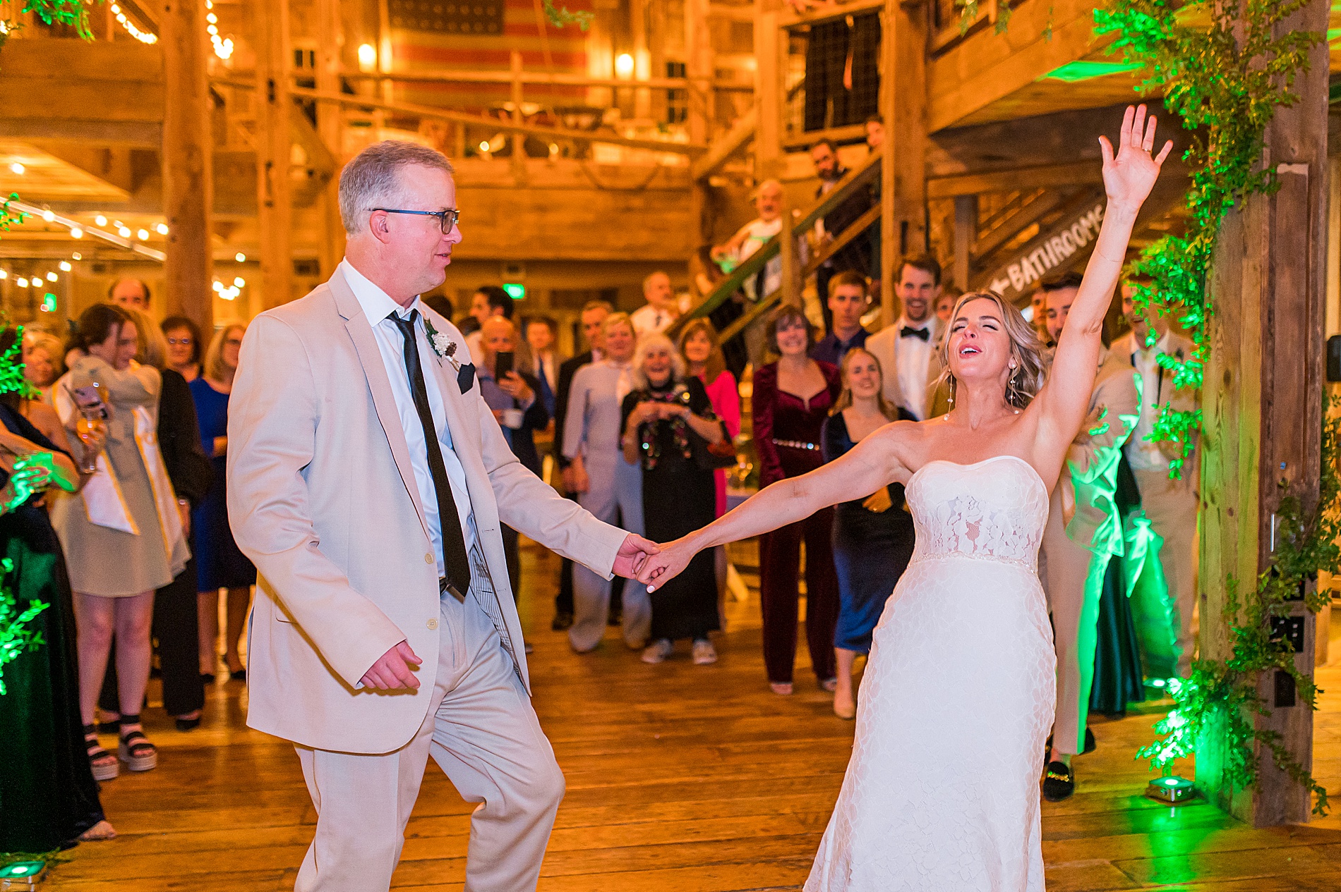 bride and father do fun dance at wedding reception