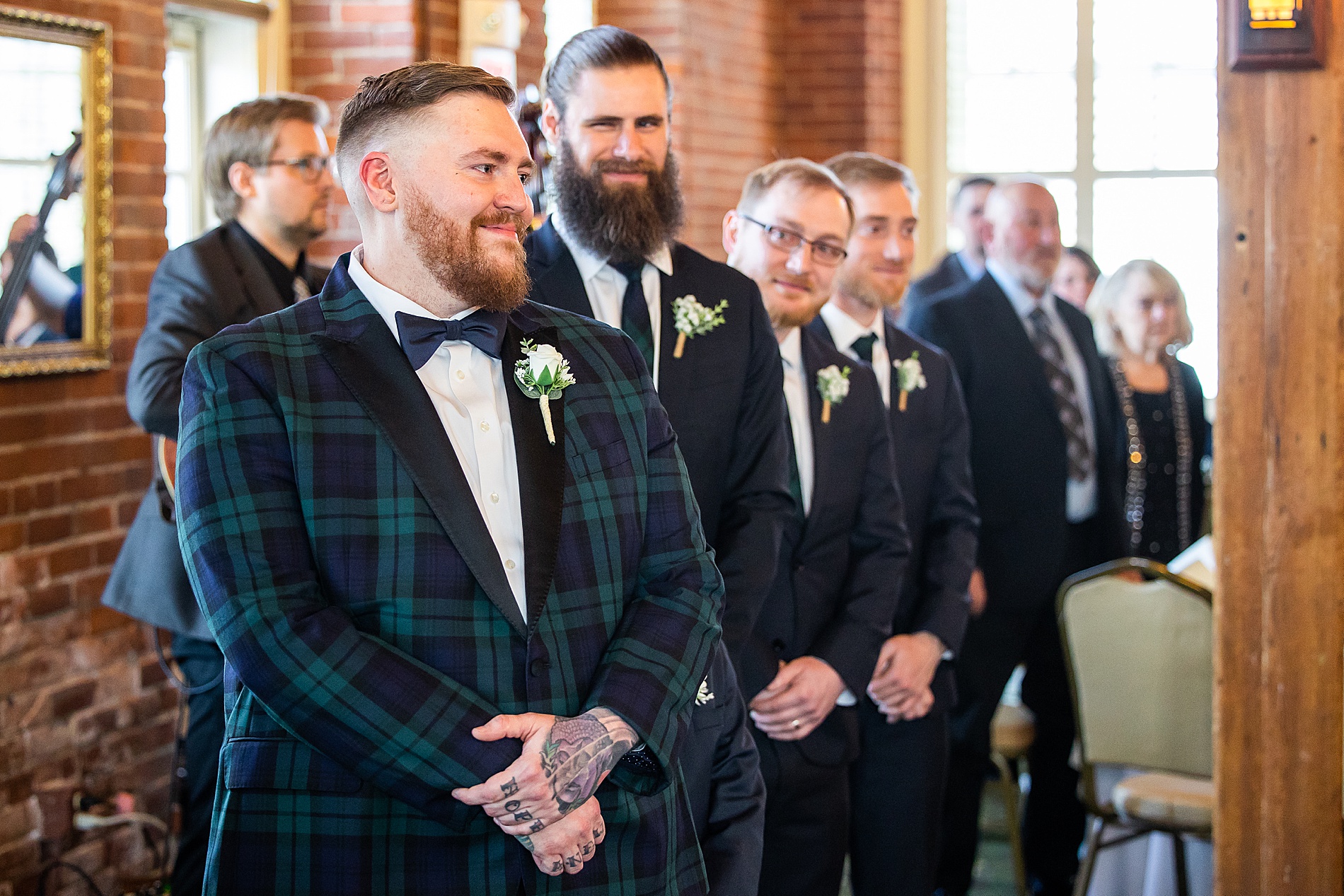 groom waits for bride at wedding ceremony