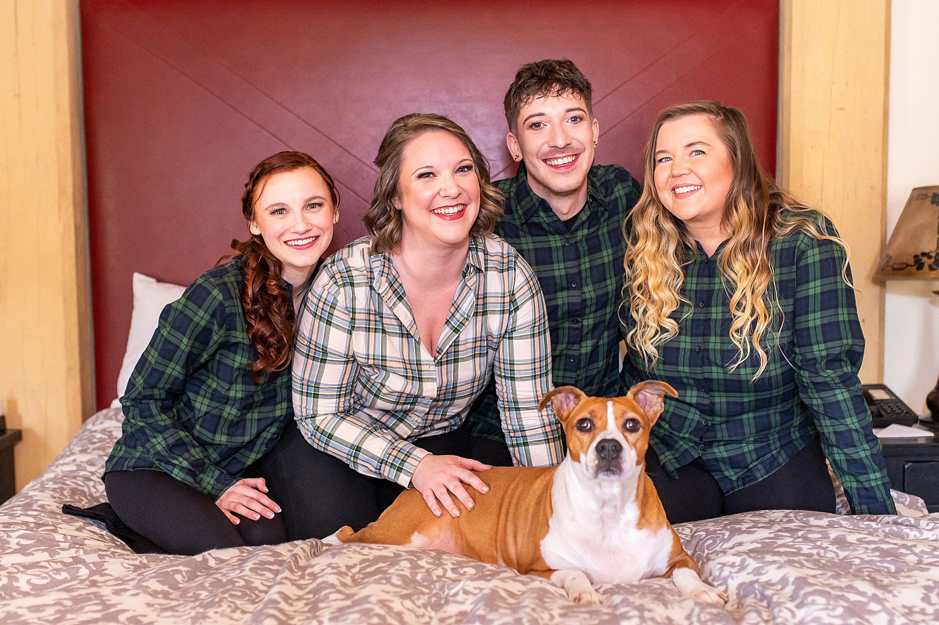 bride with her crew in matching plaid shirts