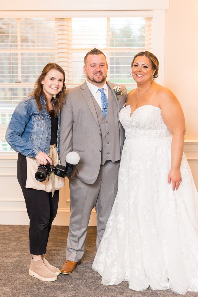 Southern NH based wedding photographer Allison Clarke with newlyweds from Elegant Spring Wedding