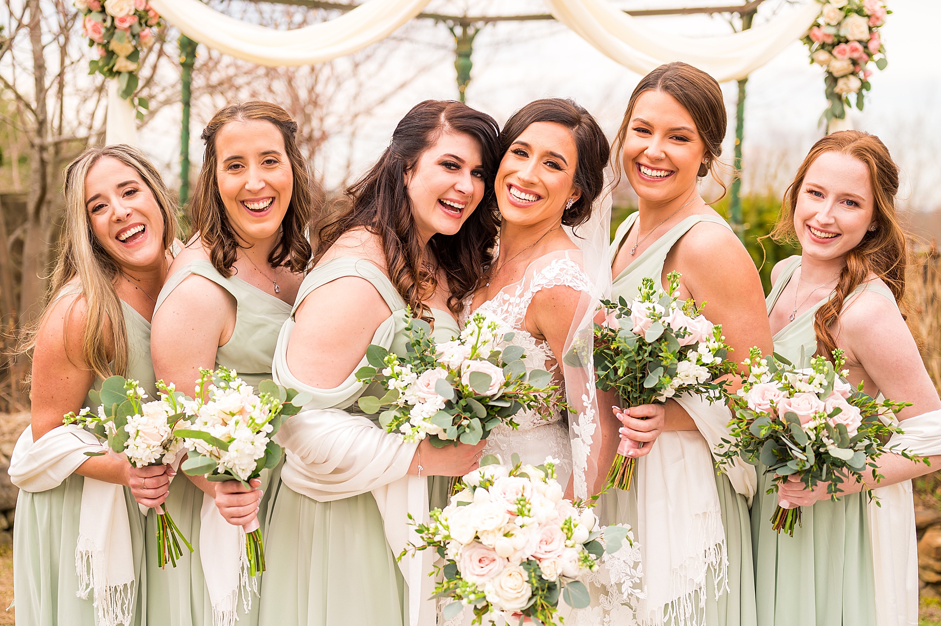 bridal party portraits outside of Granite Rose by wedgewood