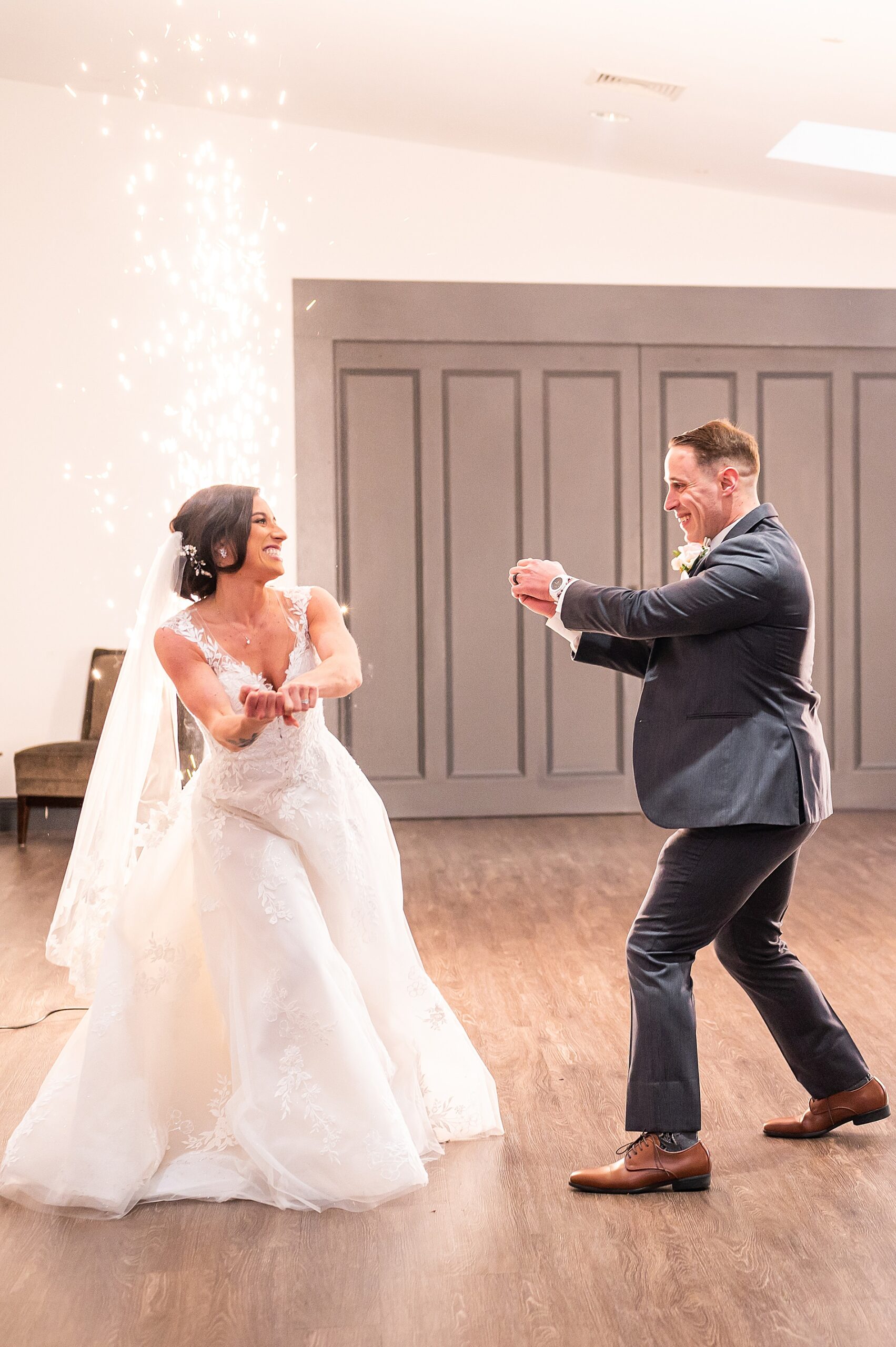 bride and groom have lightsaber fight 