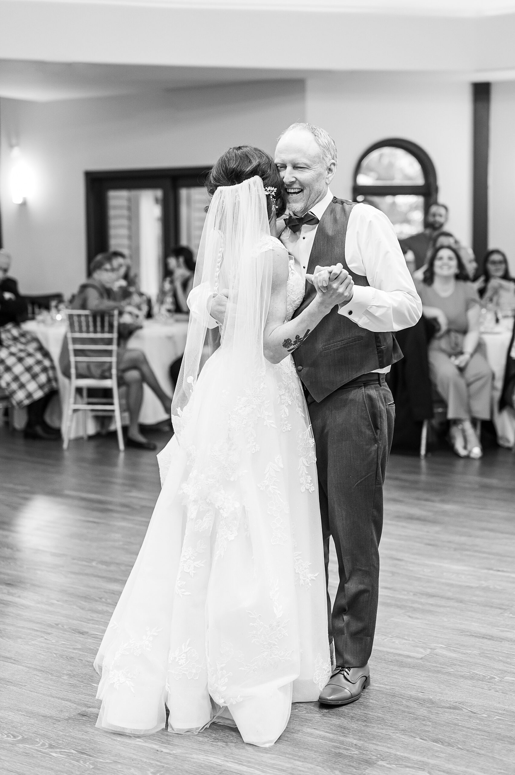 classic portrait of father-daughter dance
