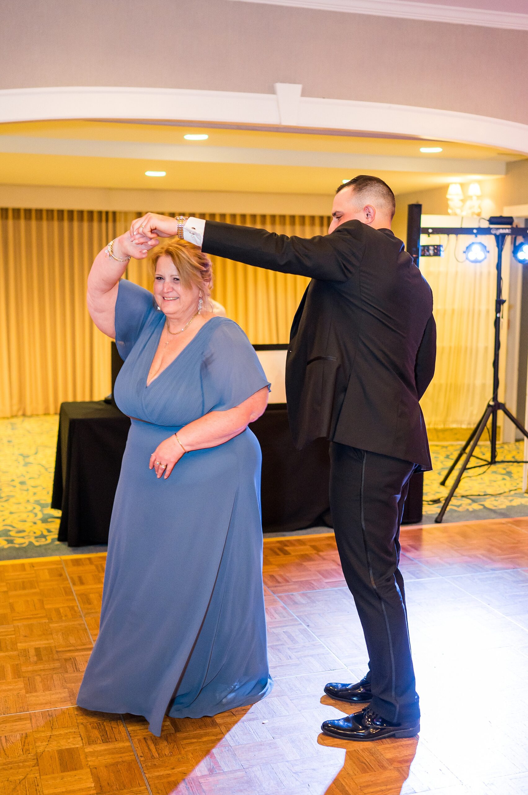 groom dances with his mom at Spring Wedding at Church Landing