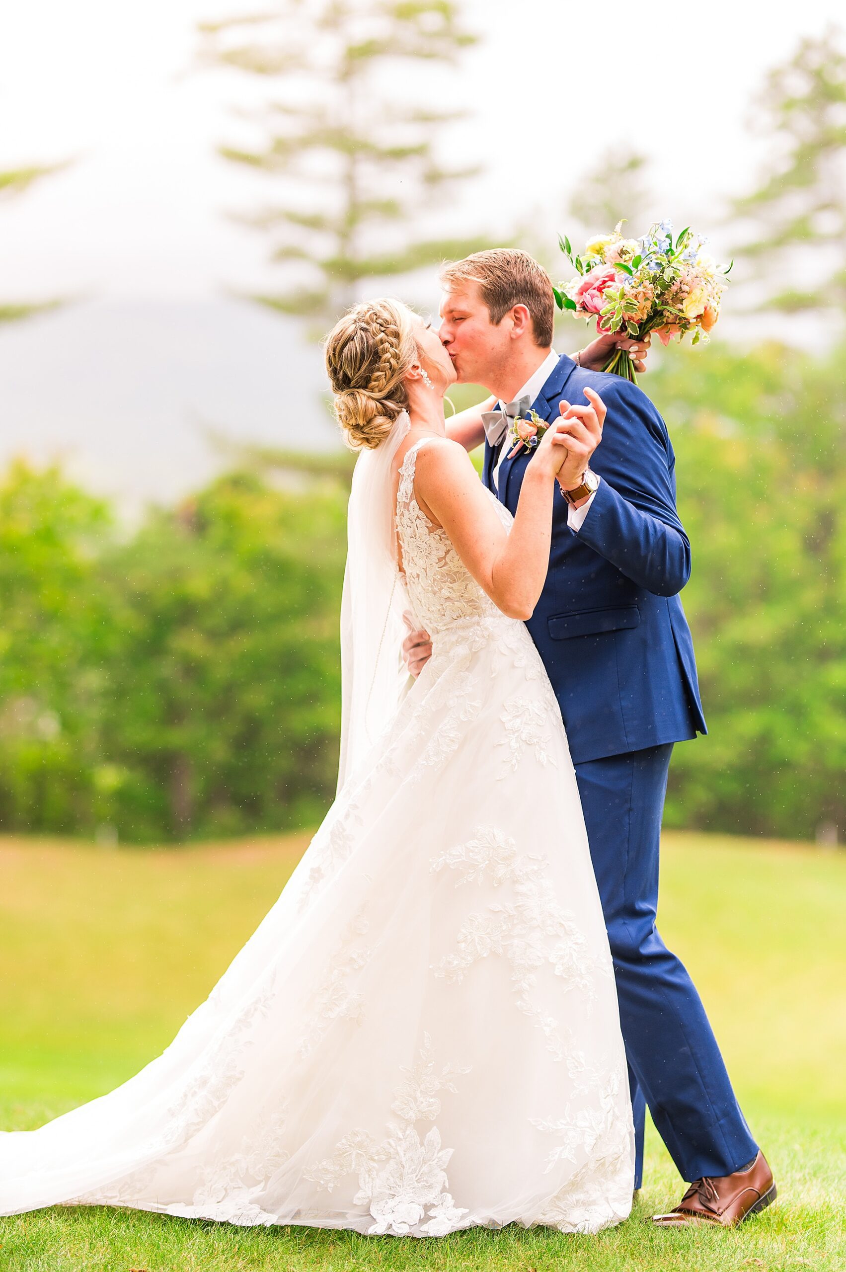 bride and groom kiss from Summer Wedding at Owl's Nest Resort  