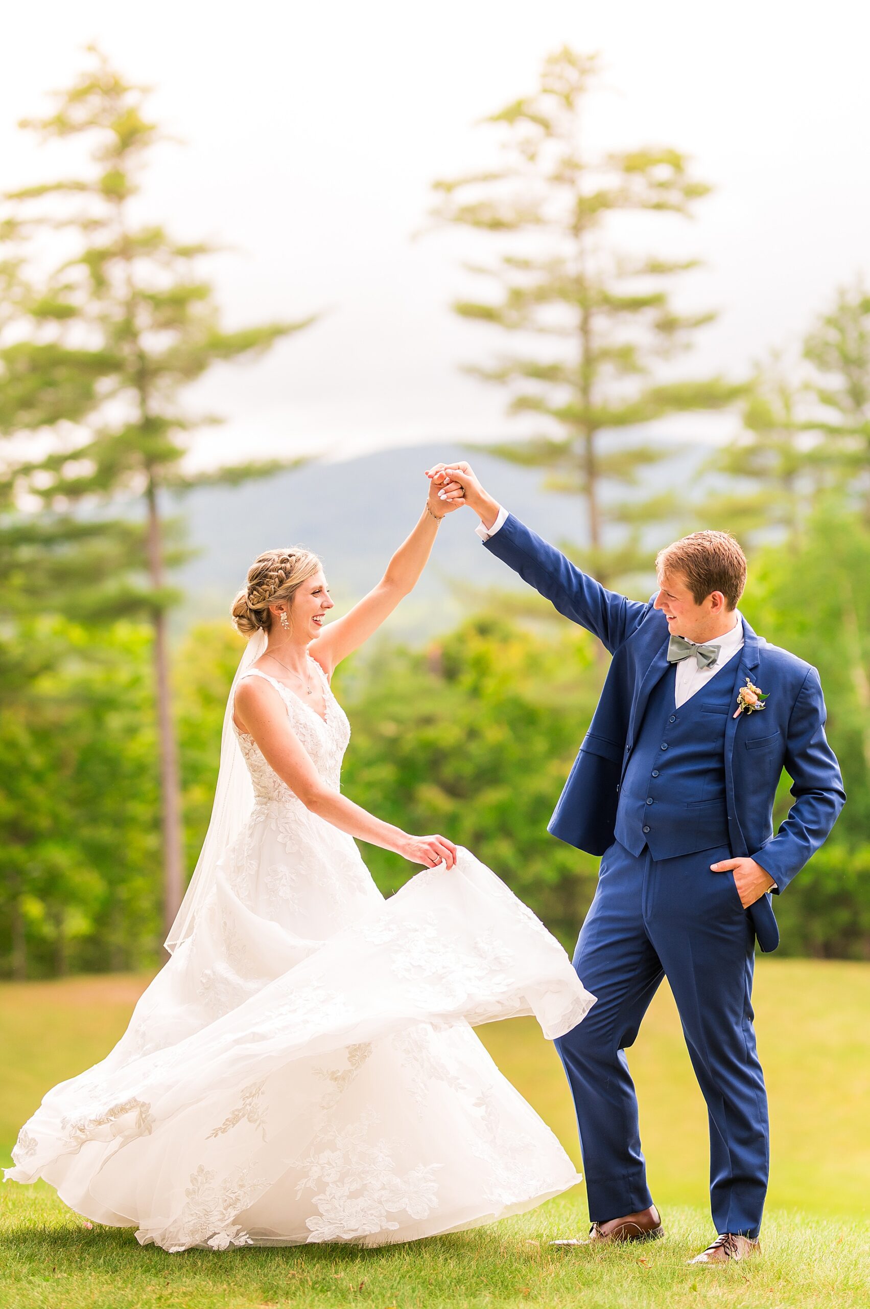bride and groom dance during wedding portraits