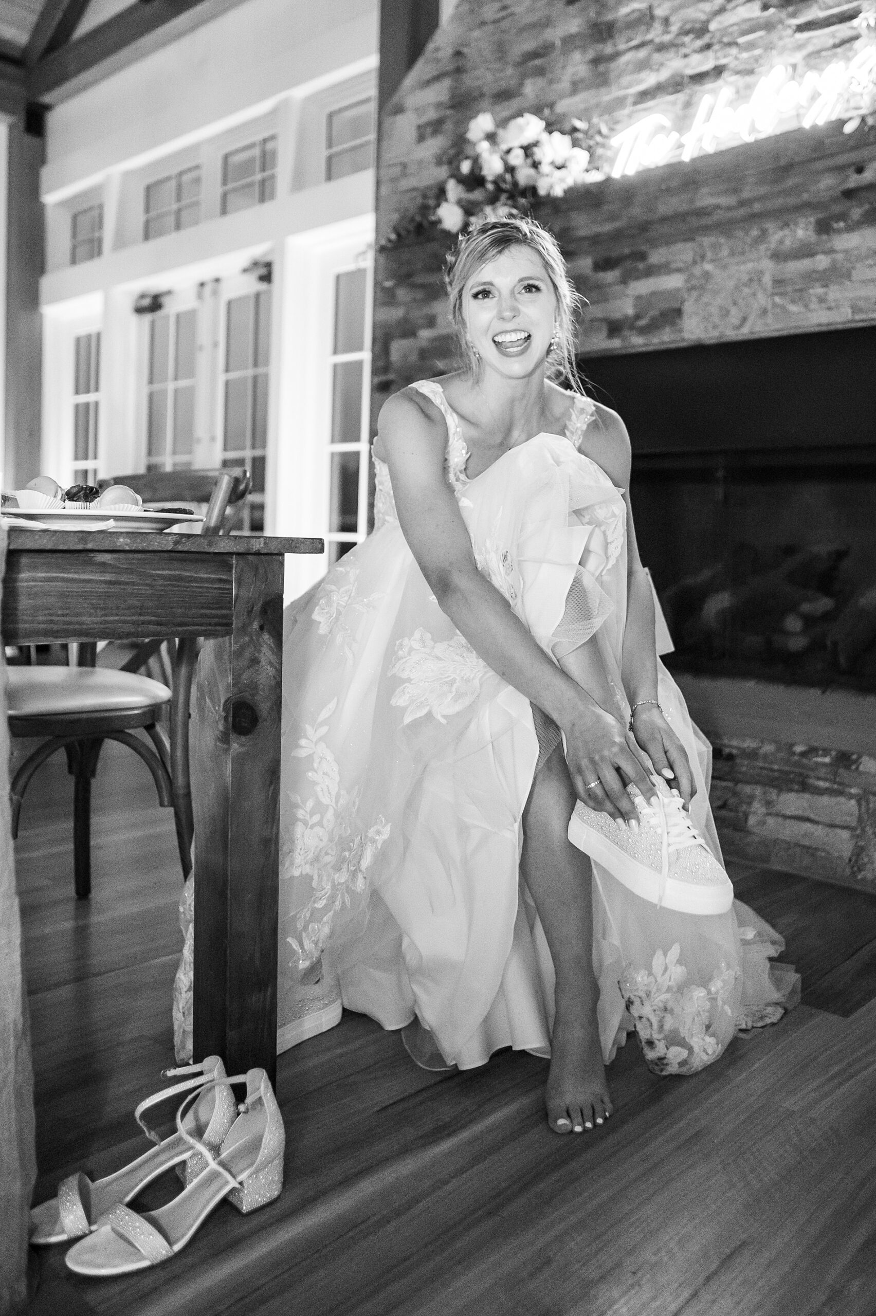 bride changes out of wedding heels