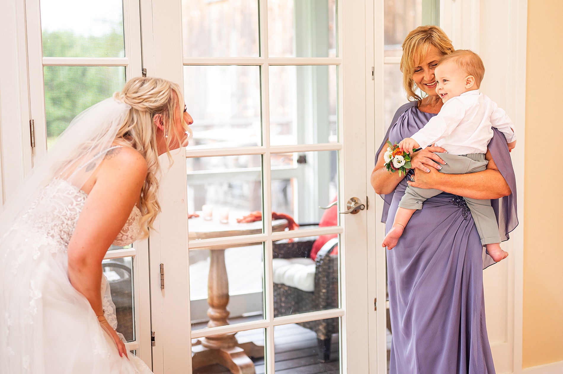 bride's first look with her little boy on wedding morning