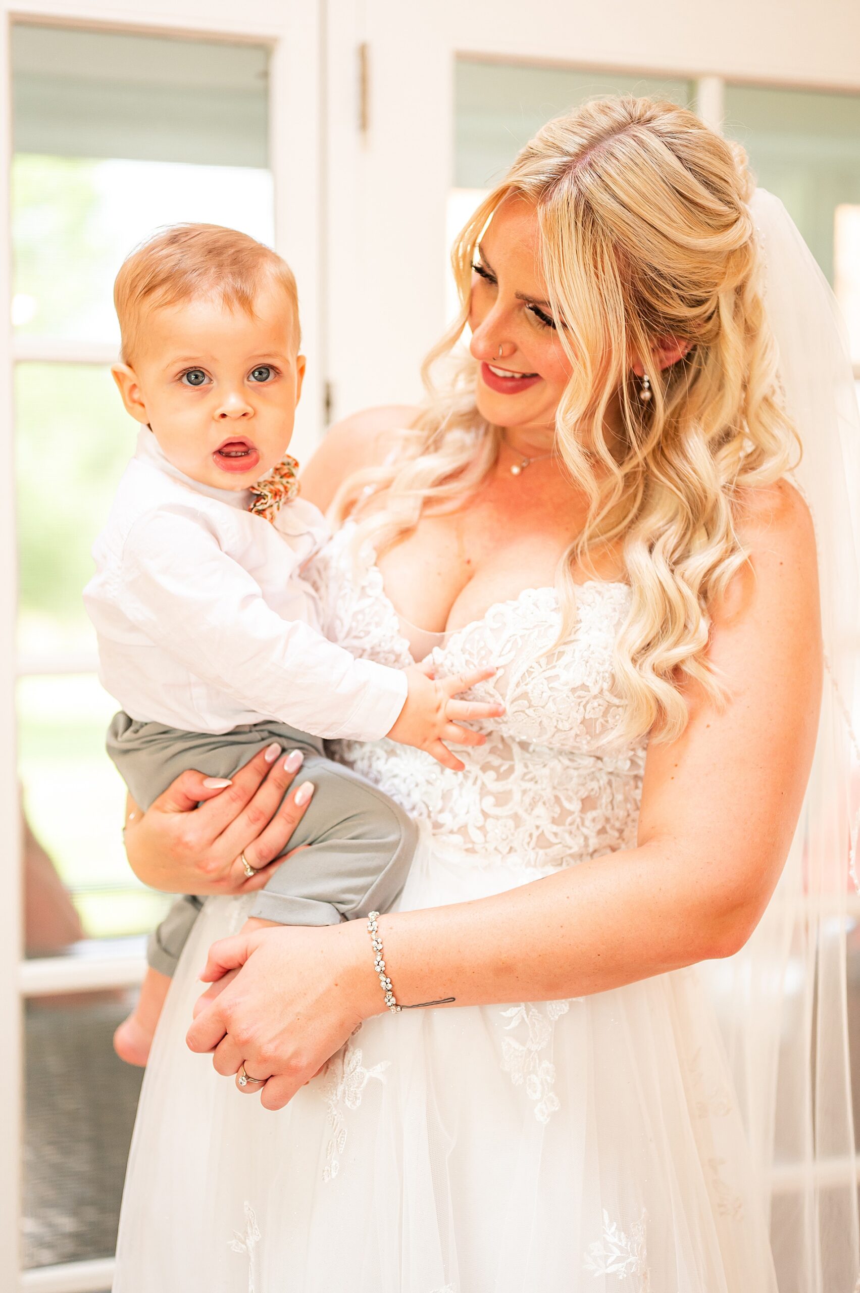 bride has first look with her son
