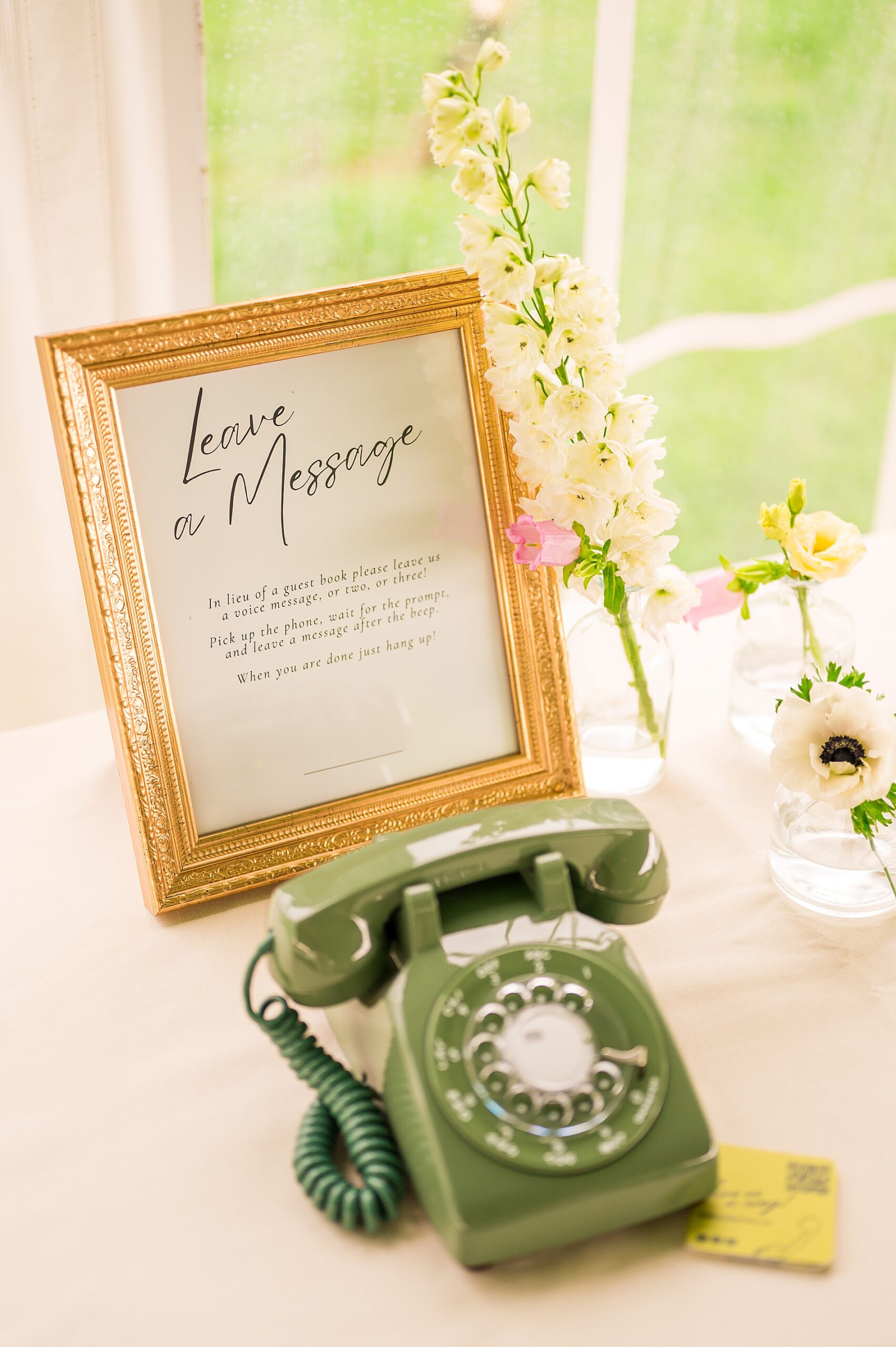 wedding reception details a phone guestbook to leave a message