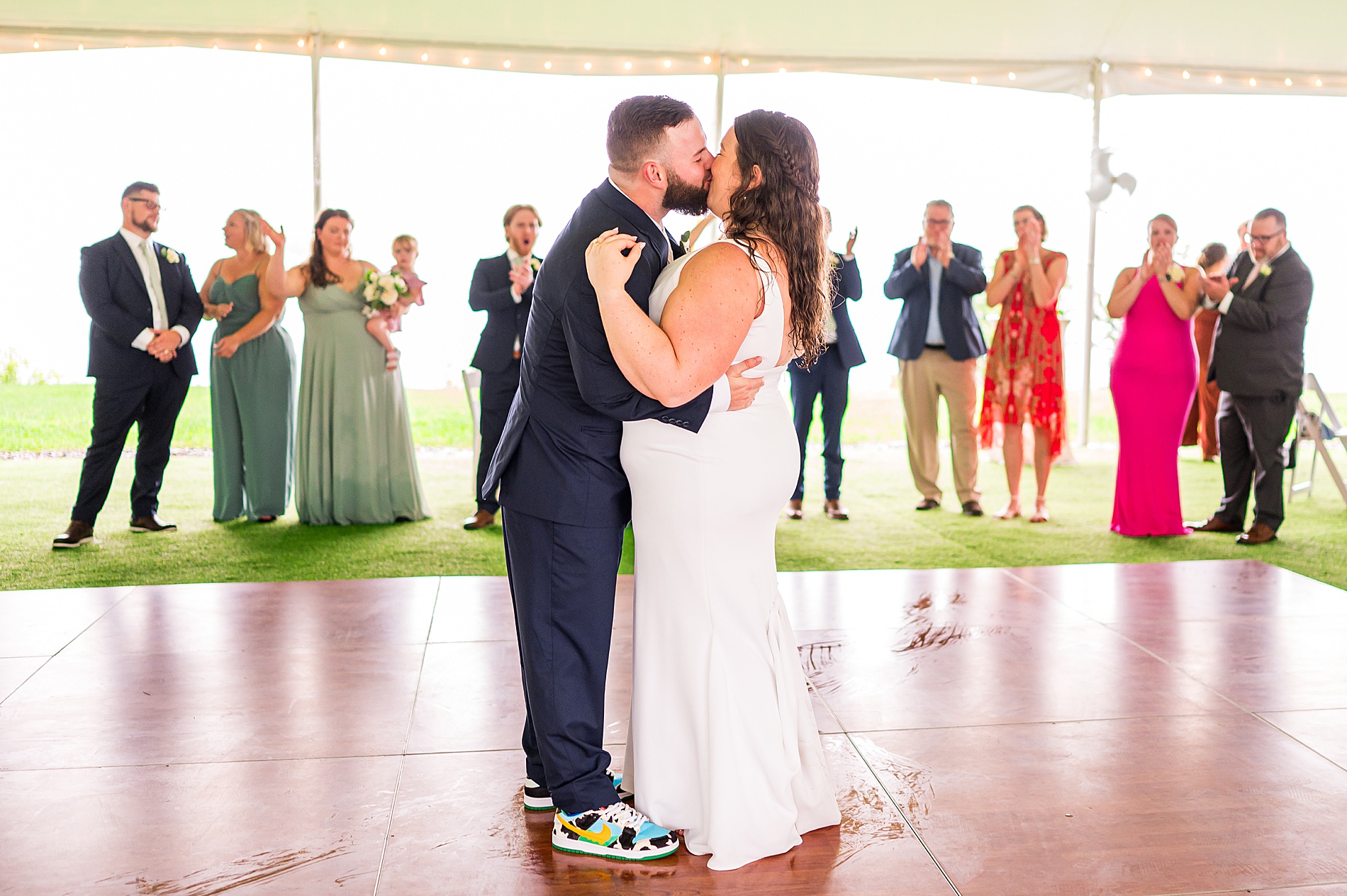newlyweds share first dance together at reception