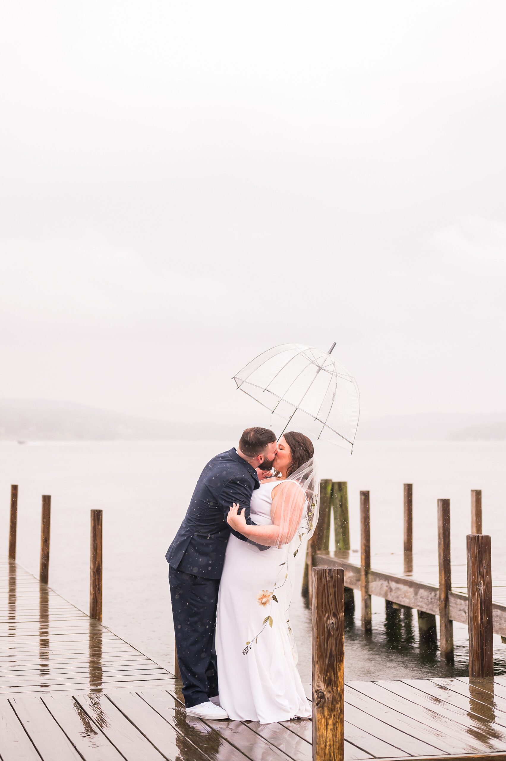 romantic wedding portraits in the rain from Waterfront Wedding at The Margate