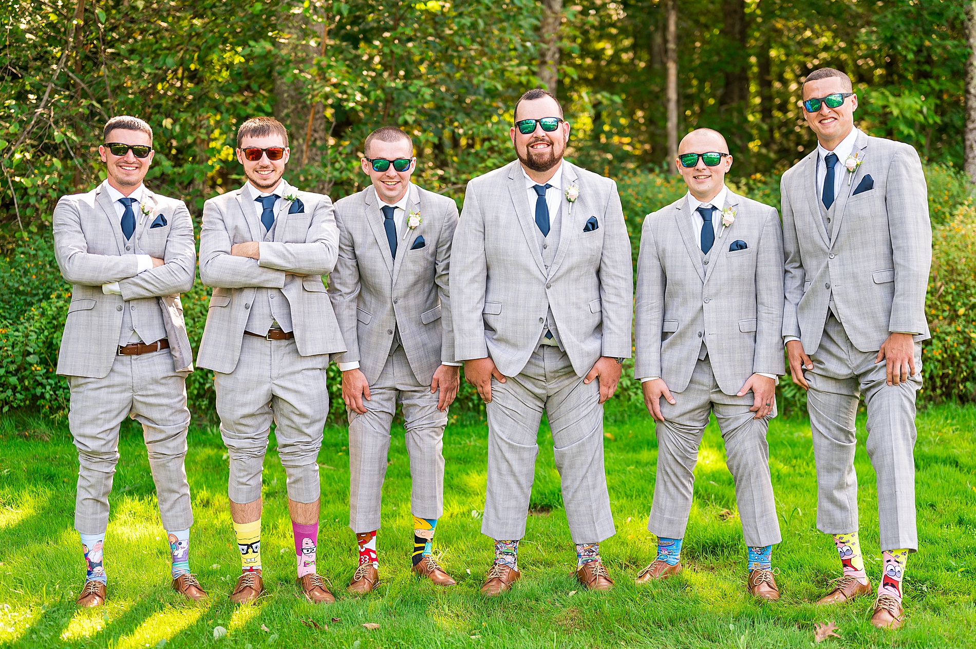 groom and groomsmen portraits wearing sunglasses
