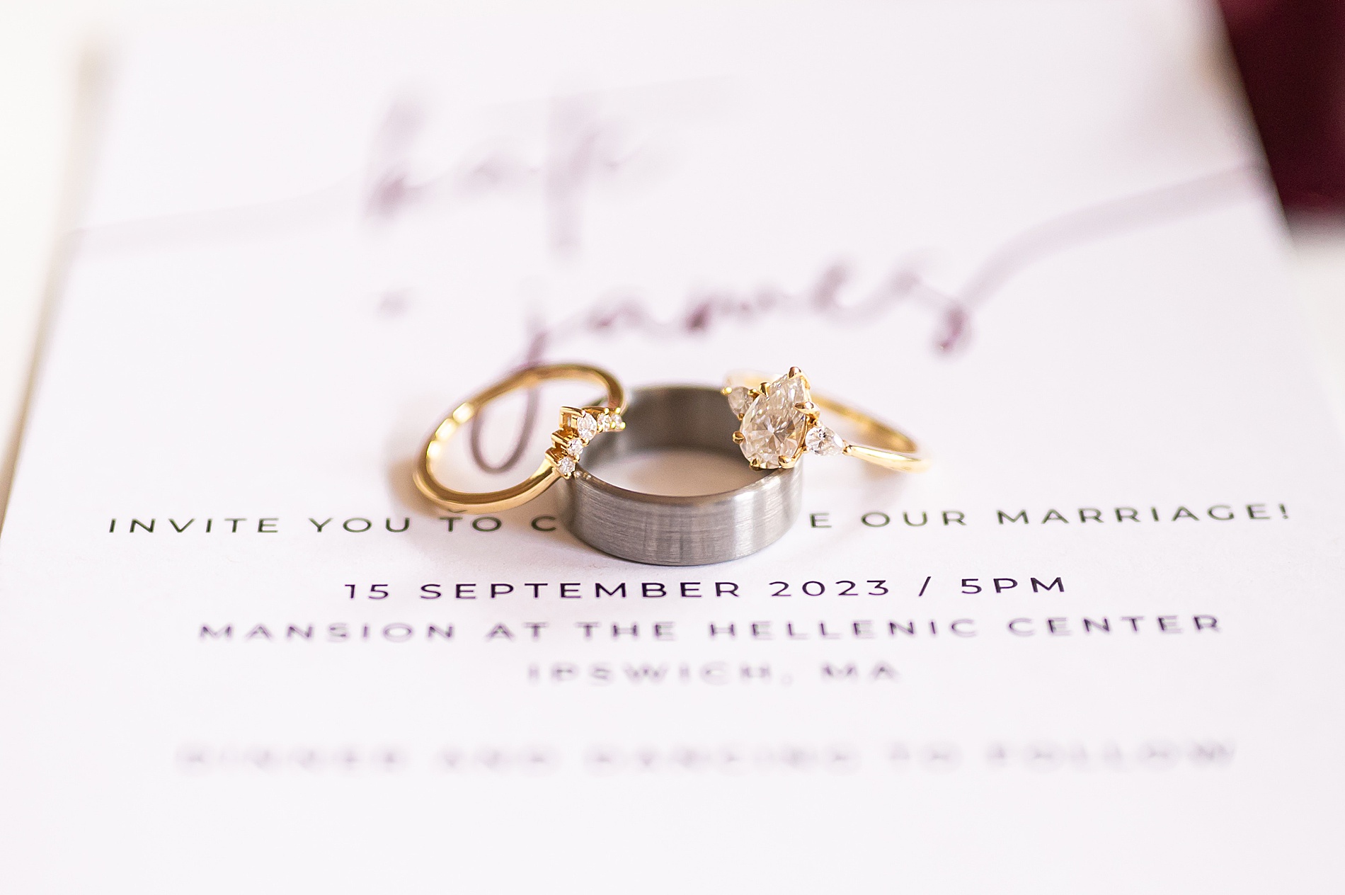 wedding invites with wedding rings on top