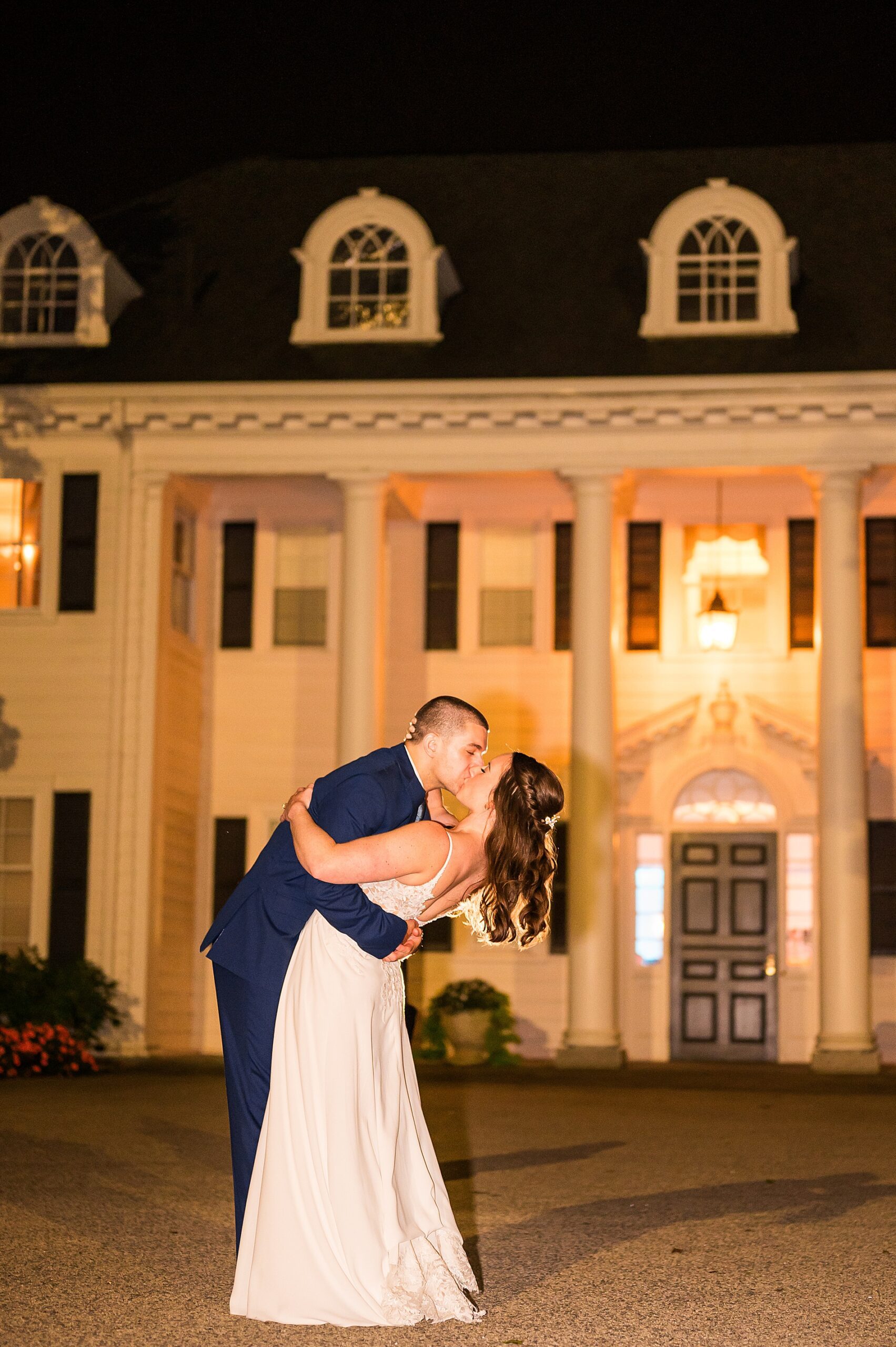 newlyweds kiss at the end of wedding night from North Shore wedding  at The Hellenic Center