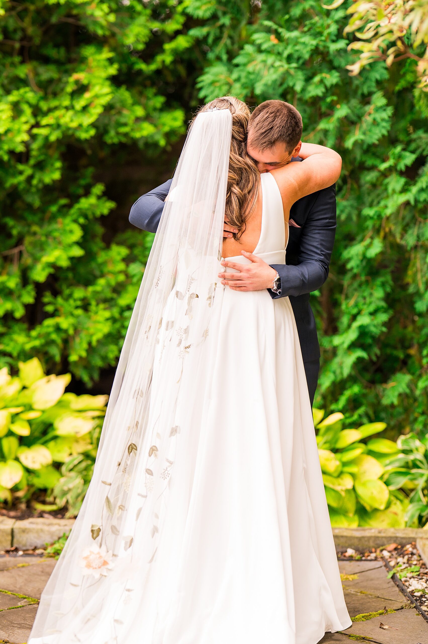 emotional first look before New Hampshire fall wedding at Manchester Country Club