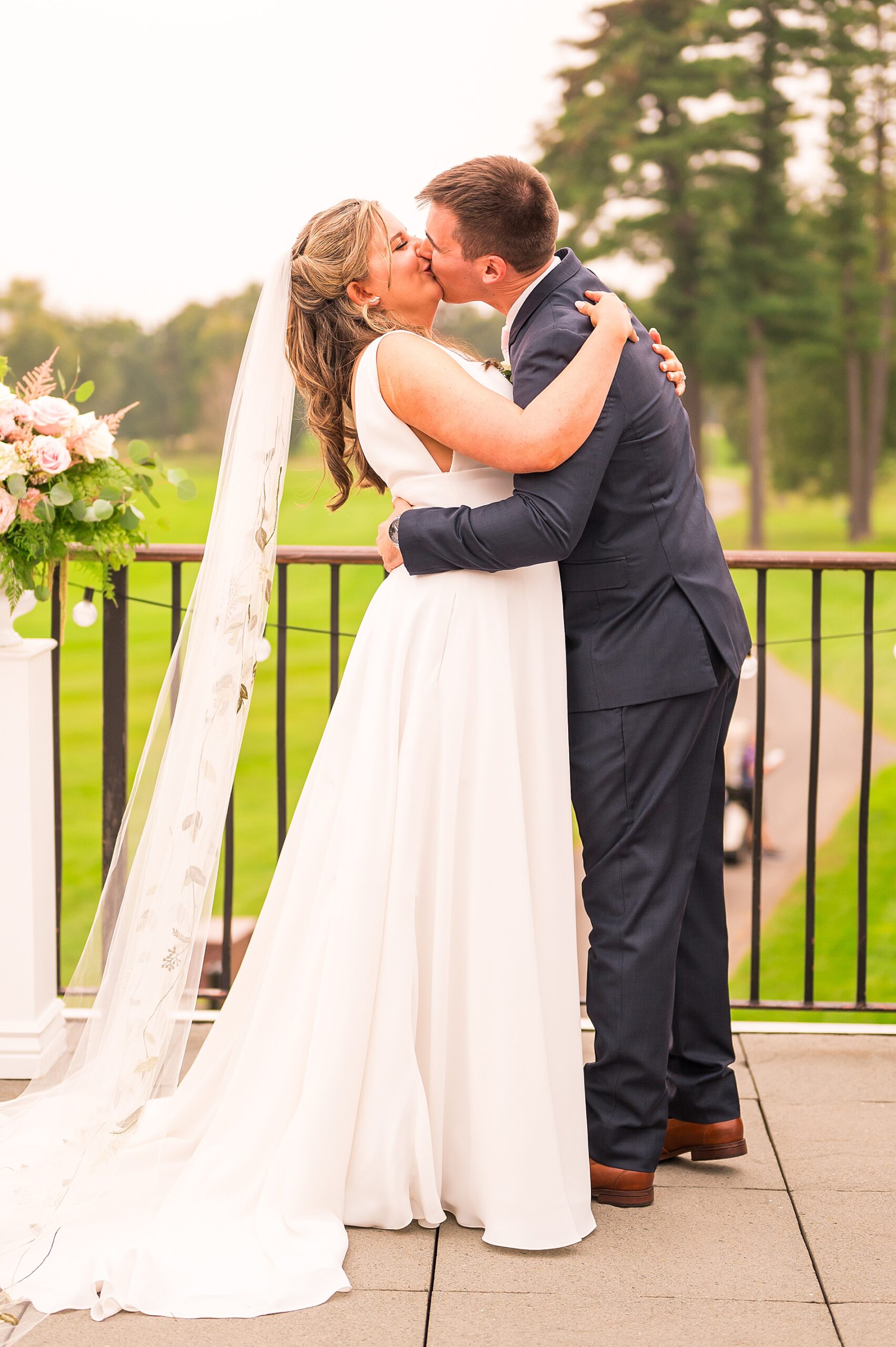 couple kiss as they are pronounced husband and wife