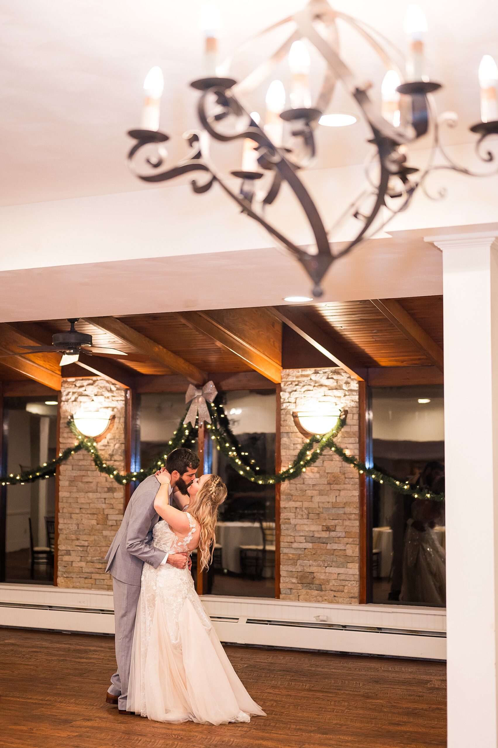 couple kiss during their private last dance from Intimate Coachmen’s Lodge Wedding