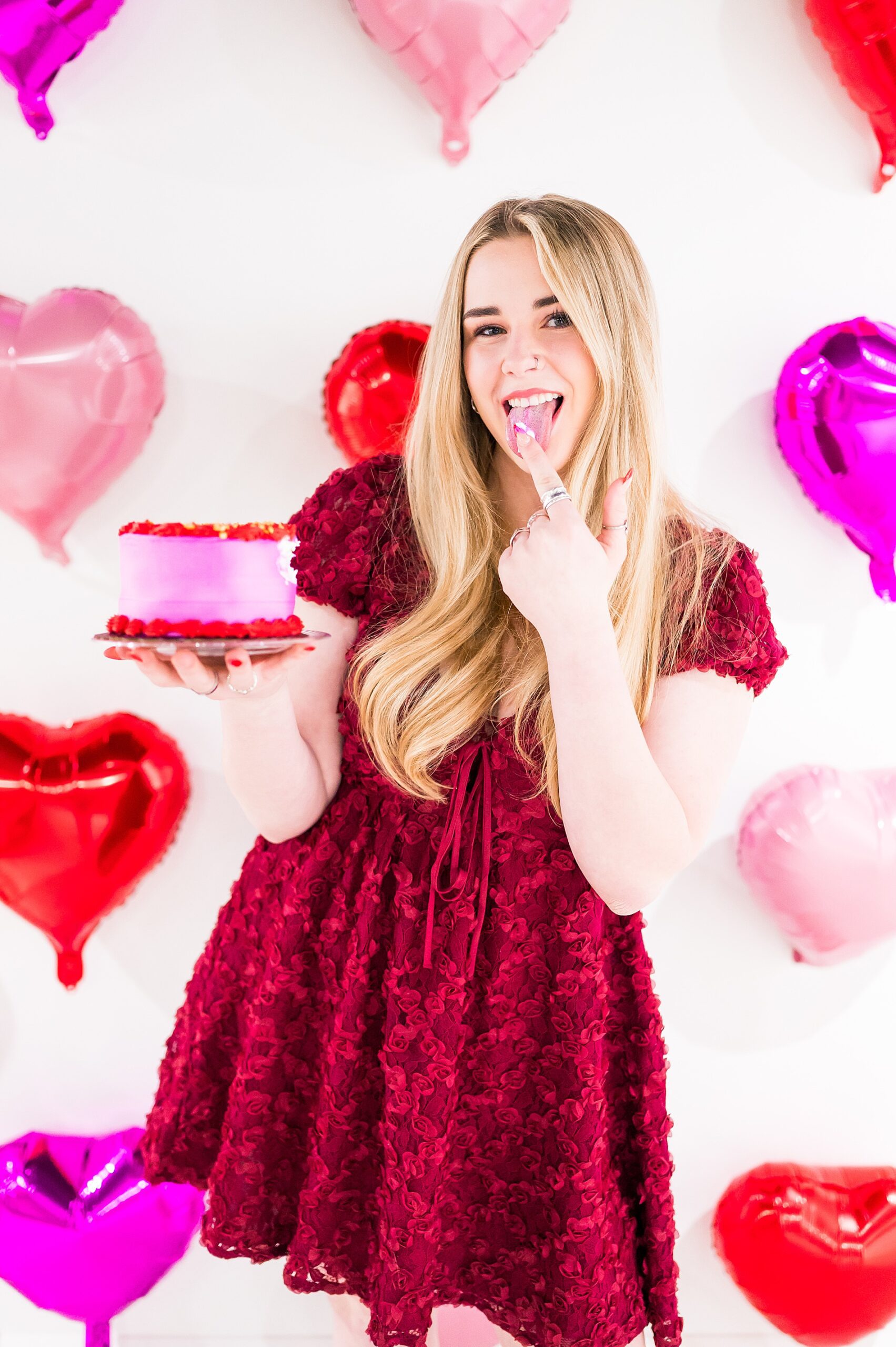 senior girl with Valentine's day cake